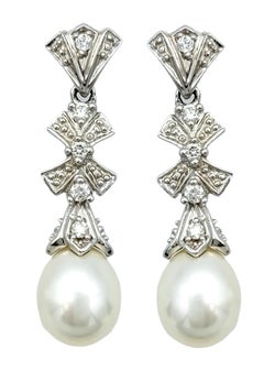 Pearl and Diamond Bow Design Dangle Earrings Set in 14 Karat White Gold