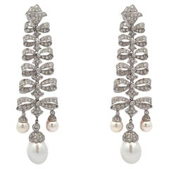 Orecchini a fiocco con perle e diamanti