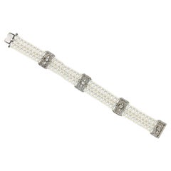 Pulsera de perlas y diamantes