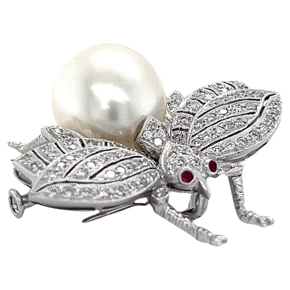 Brosche mit Perlen und Diamanten