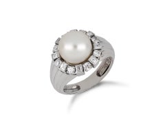 Pearl and diamond cluster ring by W. A. Bolin, Swedish, 1960