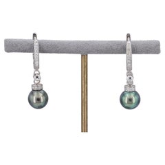 Boucles d'oreilles pendantes perles et diamants