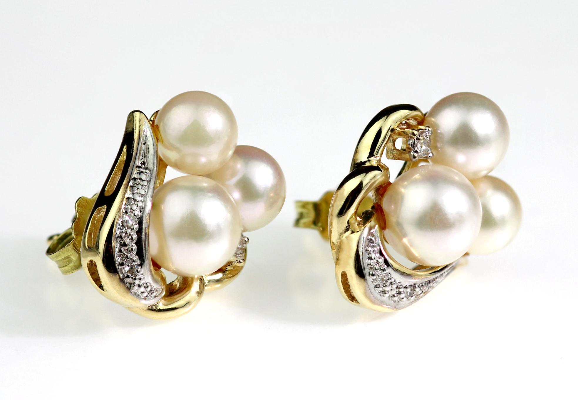 A pair of earrings set with sea-water Akoya cultured-pearl and diamonds set in a romantic heart design in 18 carat gold. 
6 x round-single cut diamonds, approximate total weight 0.04 carats
6 x sea-water Akoya culutured-pearls, dimensions from 6.7