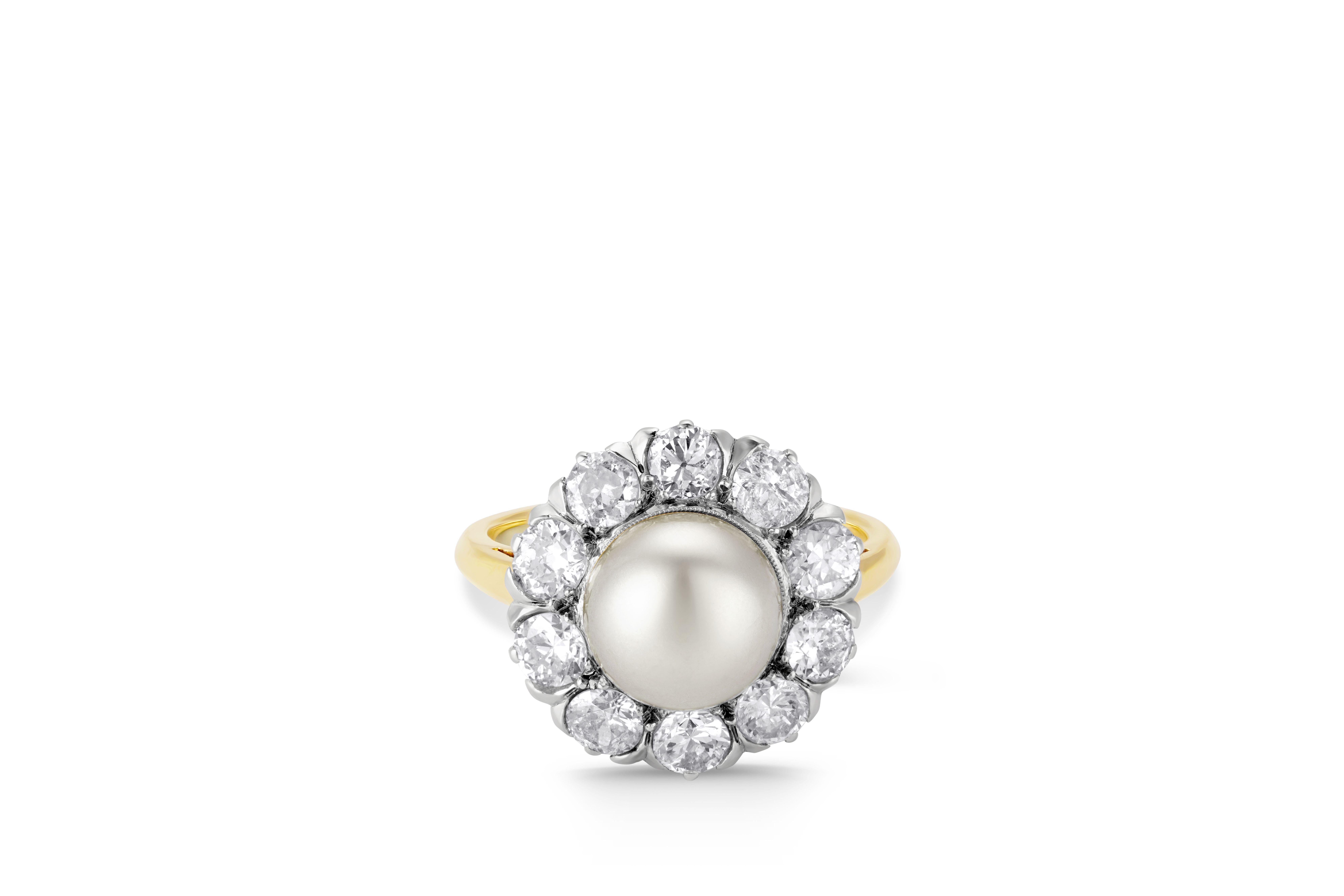 Simply Beautiful! Finely Hand crafted Edwardian 14K Yellow Gold Ring. Centering an 8.5mm Pearl, surrounded by 10 Old European-cut Diamonds, approx. 1.50tcw, Hand set in Silver. Ring size: 5.5, we offer ring resizing. More Beautiful in real time!