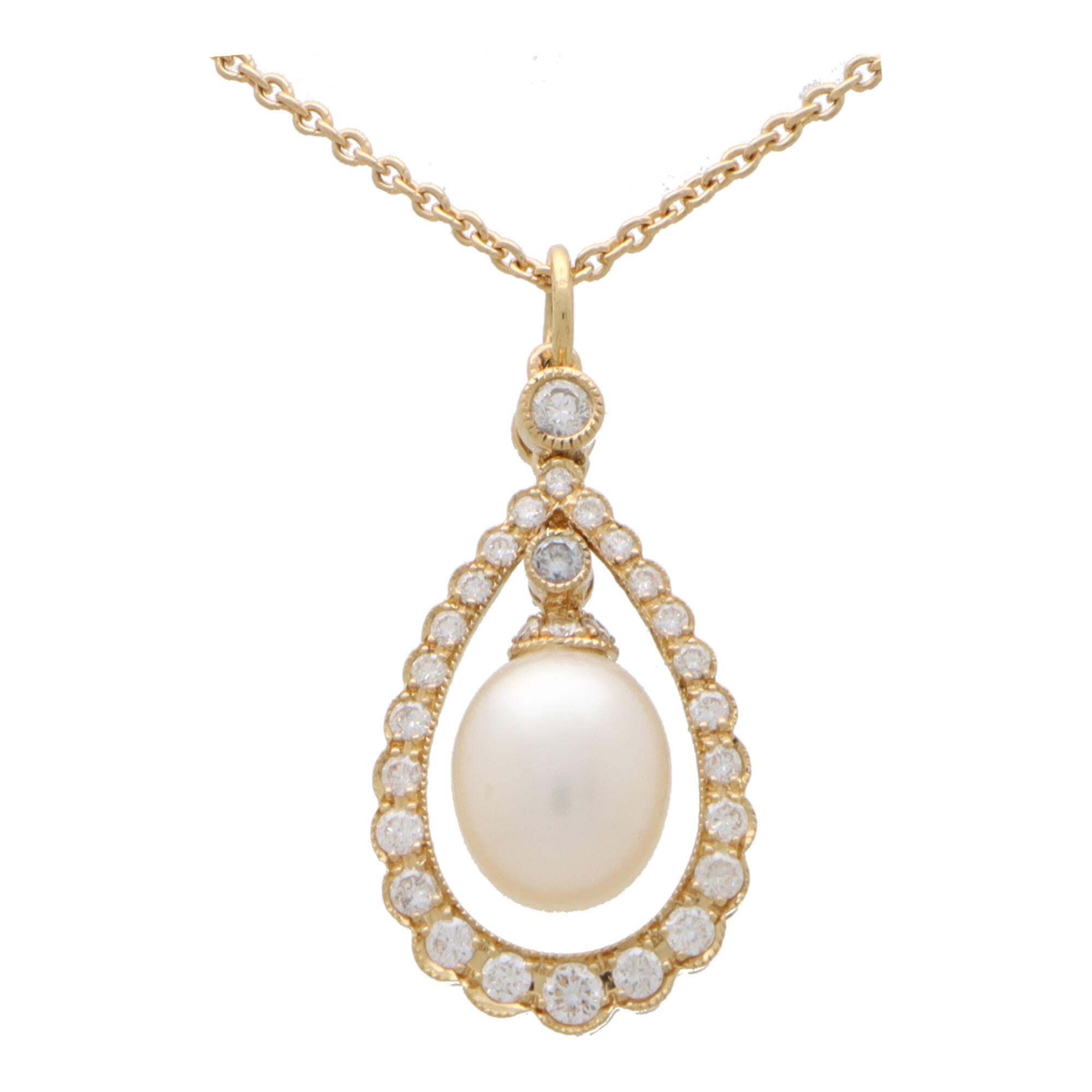  A fabulous cultured pearl and diamond garland pendant necklace set in 18k yellow gold.

The pendant prominently features a 6 x 8-millimetre pearl that elegantly hangs within a circular diamond set garland motif. To the top of the pearl is a single