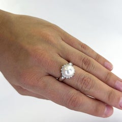 Pearl and diamond halo ring in white gold