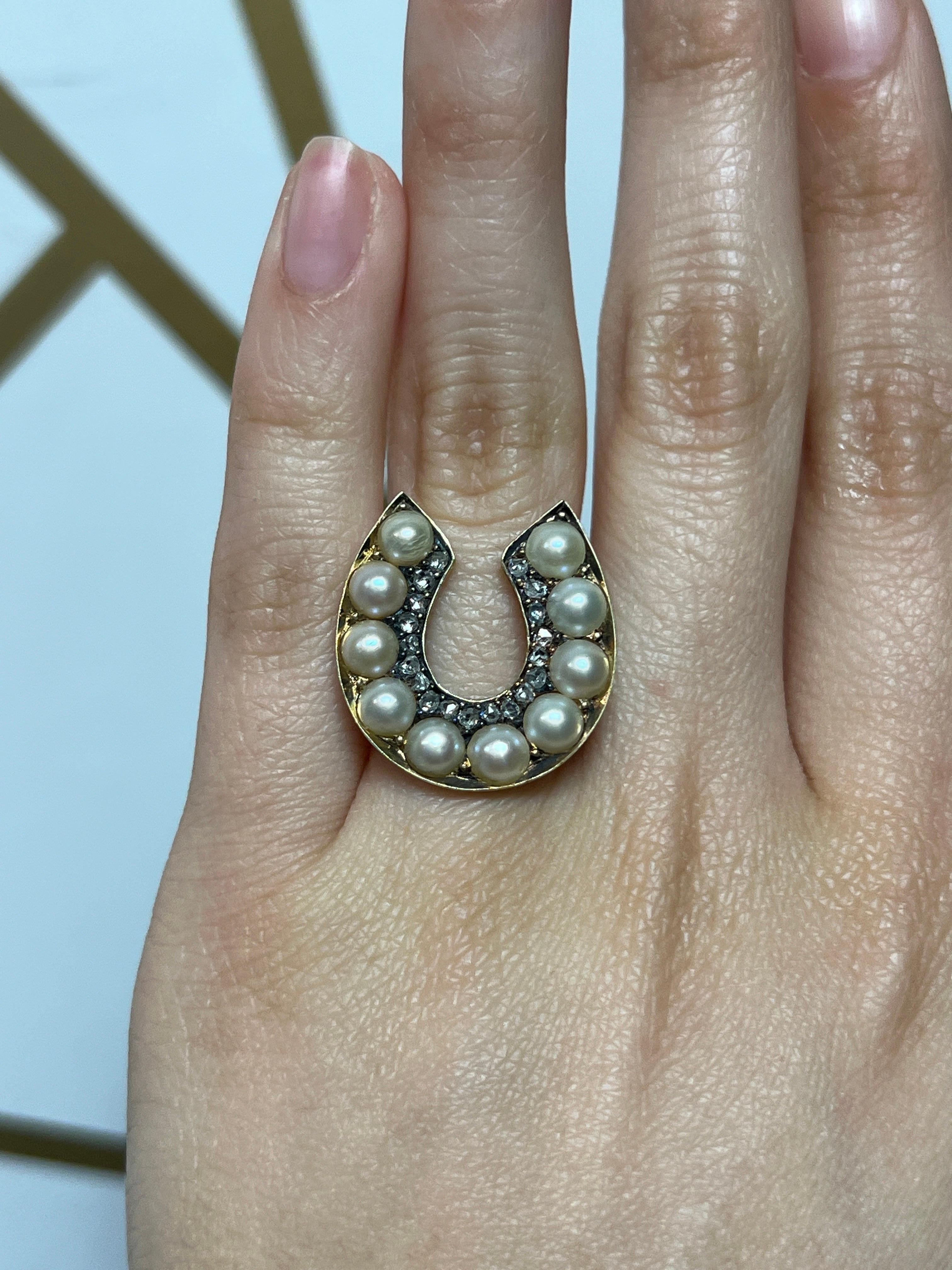 Pearl and Diamond Horseshoe Ring

A antique stickpin made circa 1900 remounted and a set as a ring. 

Set with 10 pearls and 19 diamonds. 
Ring Size: 5.75
Resizable free of charge
Metal type: 18 Karat gold