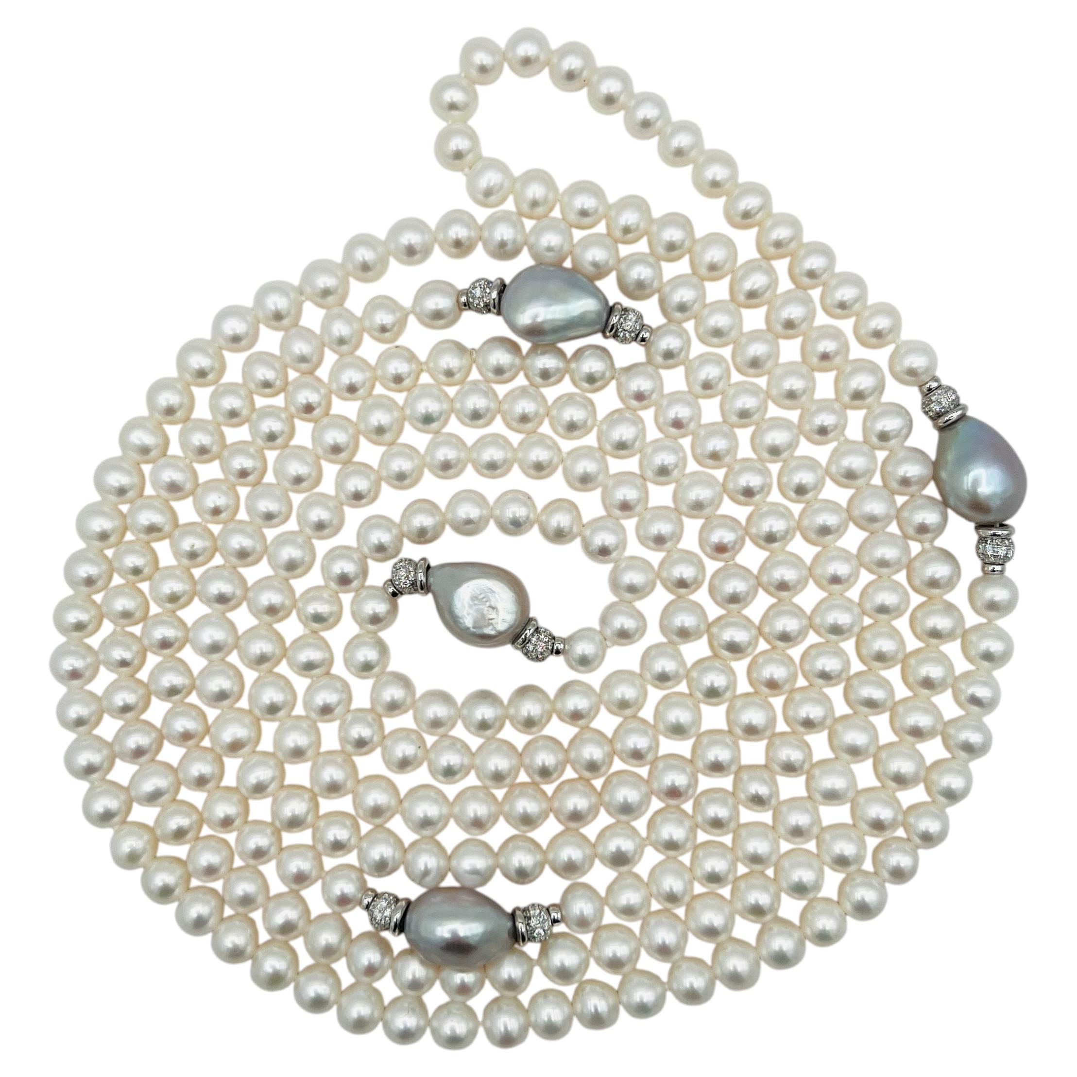 Collana a più fili di perle e diamanti in oro bianco 18 carati