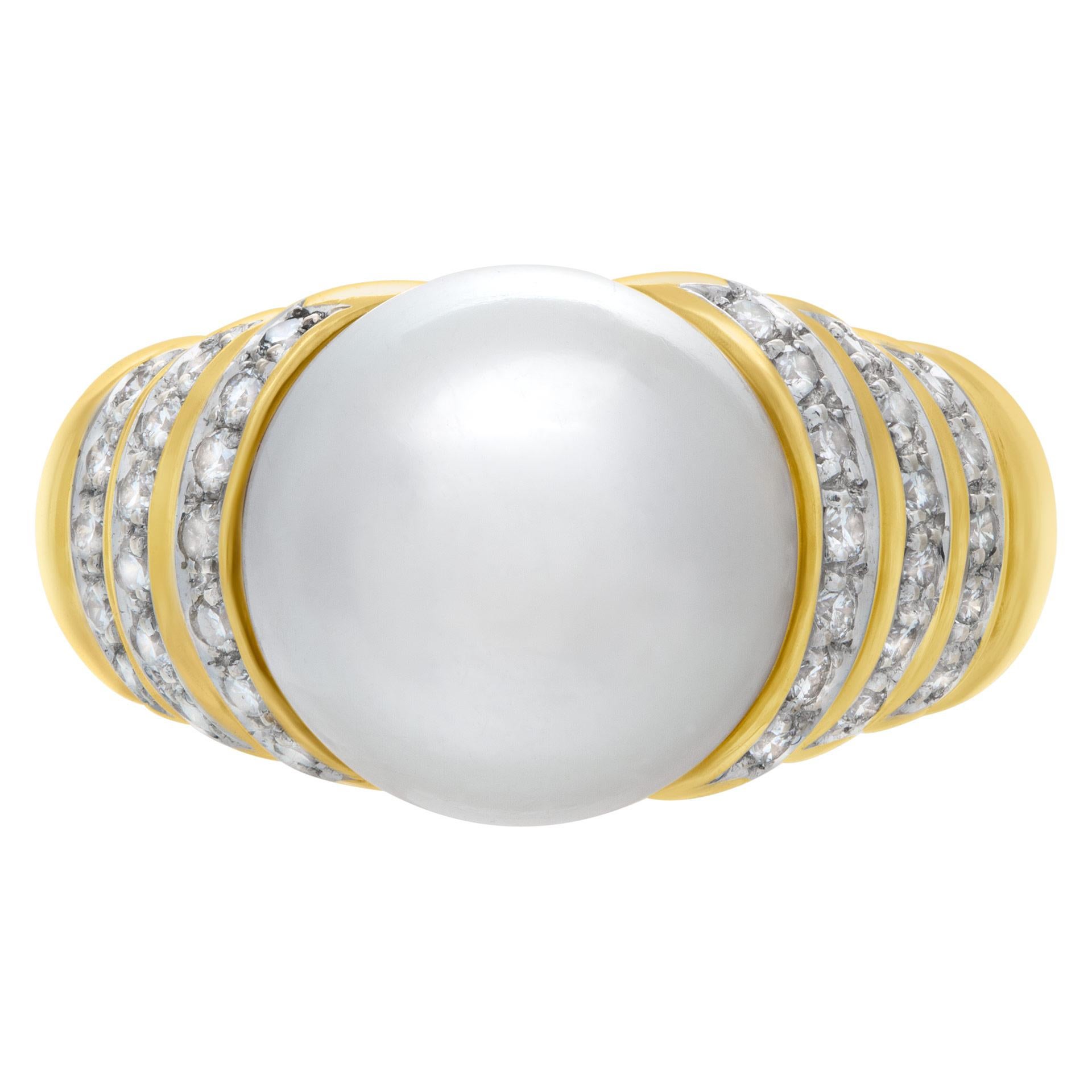 Stunning 12mm Water Pearl and approximely .36 carats in diamond accents set ring in 18k yellow gold. Size 6.75  This Pearl/diamond ring is currently size 6.75 and some items can be sized up or down, please ask! It weighs 10.1 pennyweights and is