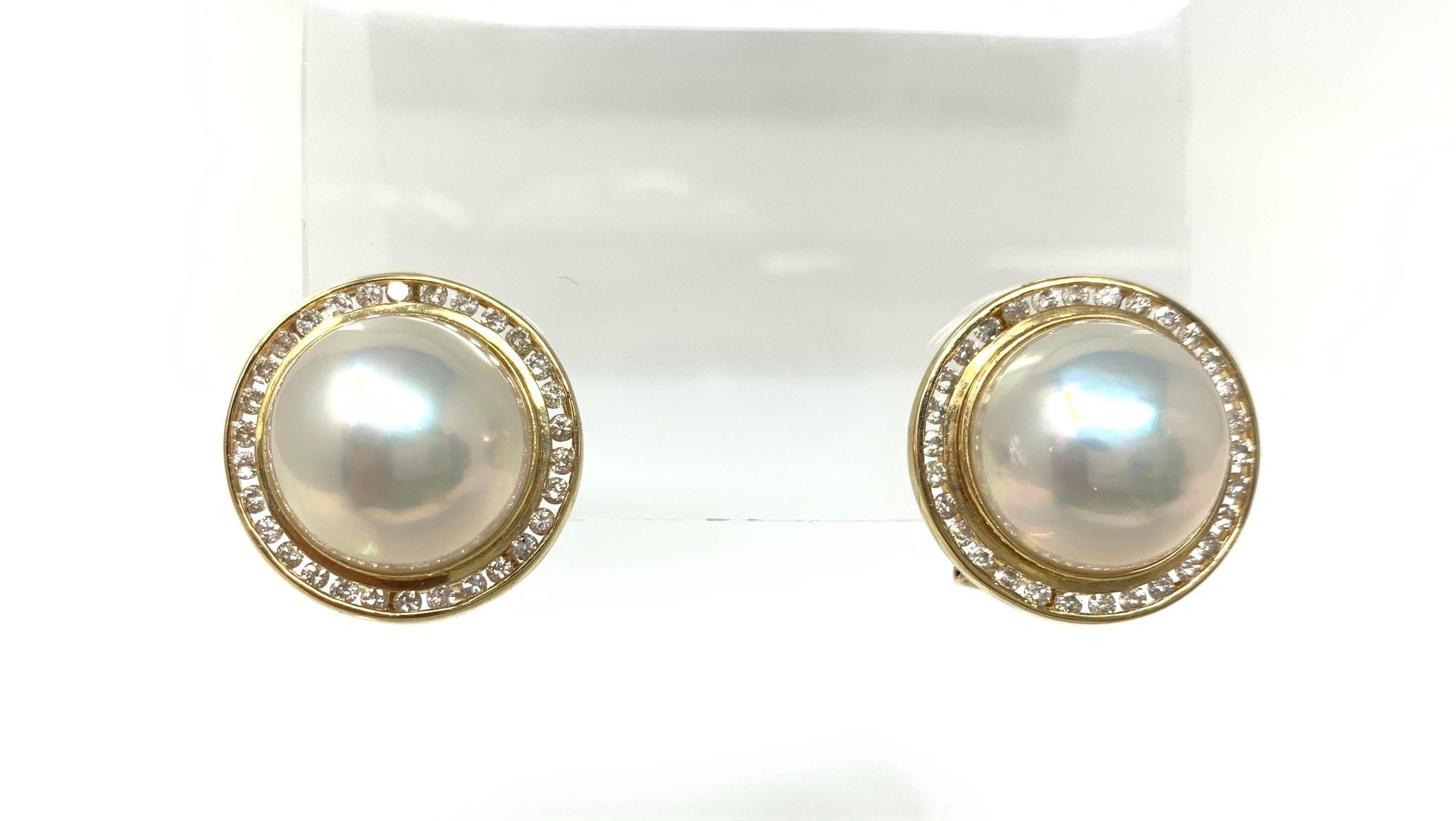 Moguldiam Inc's pearl and diamond stud earrings are beautifully custom handmade in 14 k yellow gold. 
 
Diamond weight : 1.25 carat 
metal : 14 k yellow gold. 