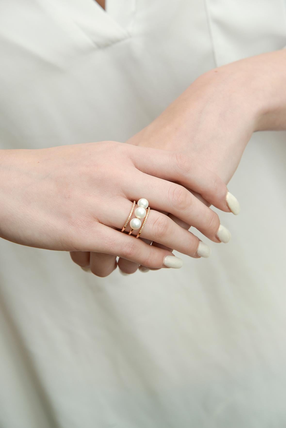 Dreifach-Ring mit Perlen und Diamanten aus 18 k Roségold.

Größe 6.5