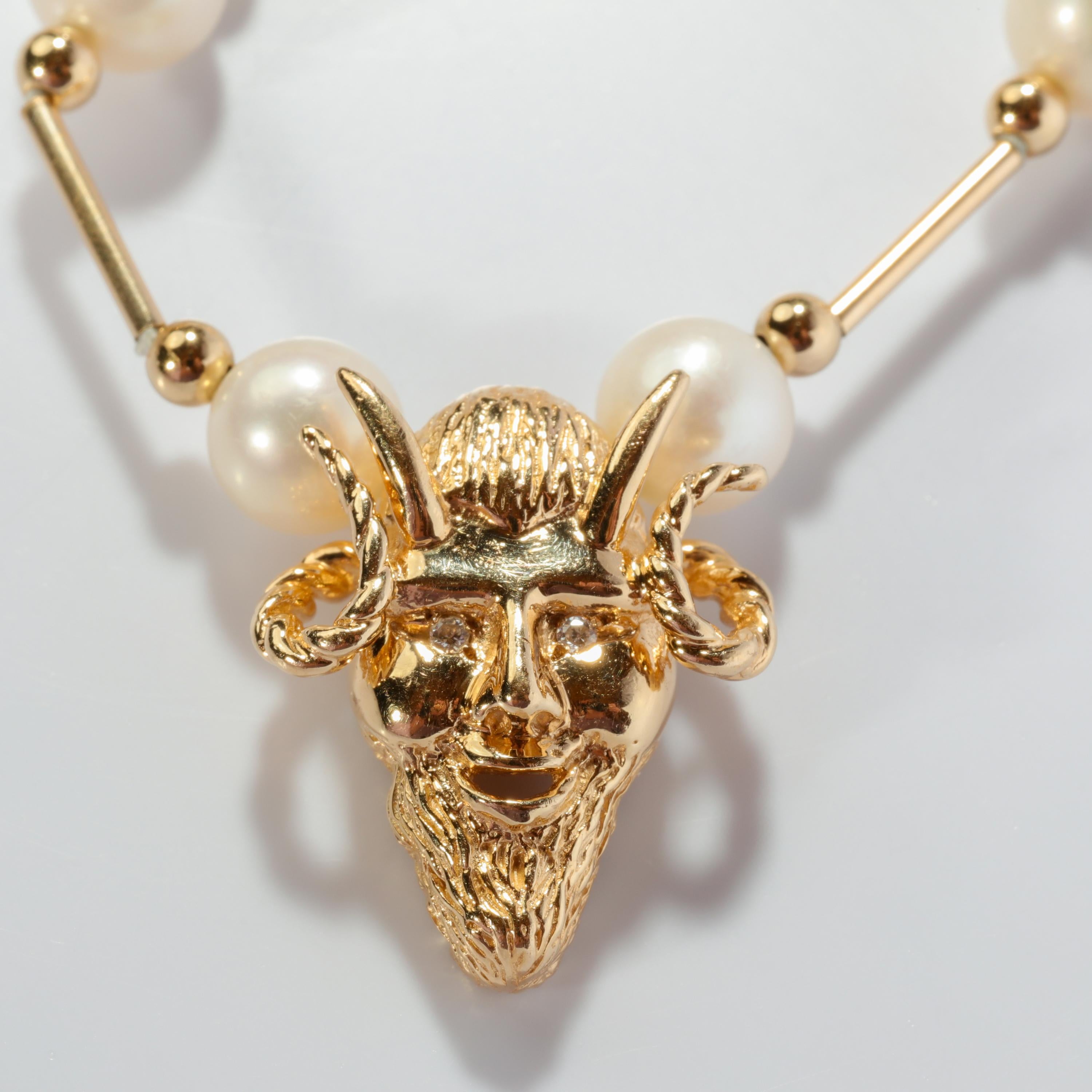 I'll see your Harry Winston 34-carat Golconda diamond necklace with Burmese Ruby and angel skin coral clasp and raise you one gold pearl station necklace with a horned devil head focal point amulet. Sorry, but when it comes to the deeply unusual,