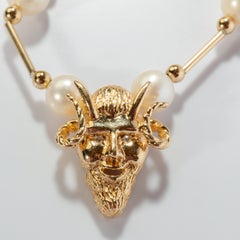 Pearl and Gold Necklace with Horned Devil Amulet
