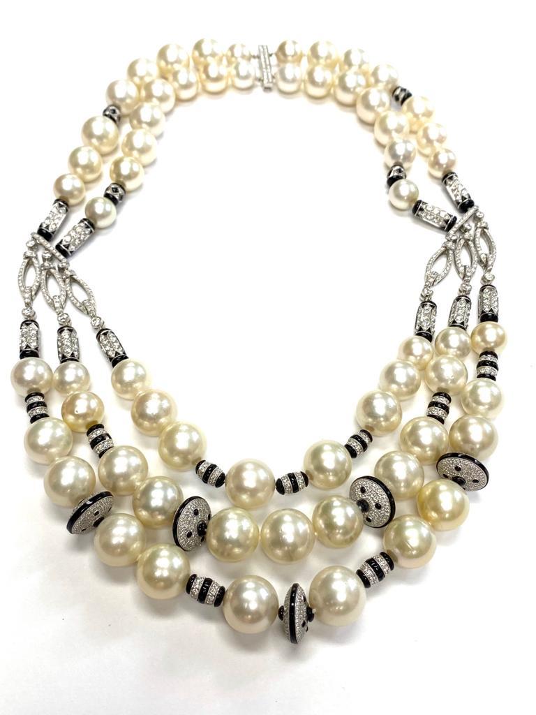 Pearl And Onyx Necklace in Platinum, from  'G-One' Collection

Diamond: G-H / VS Approx Wt: 16.23 Carats