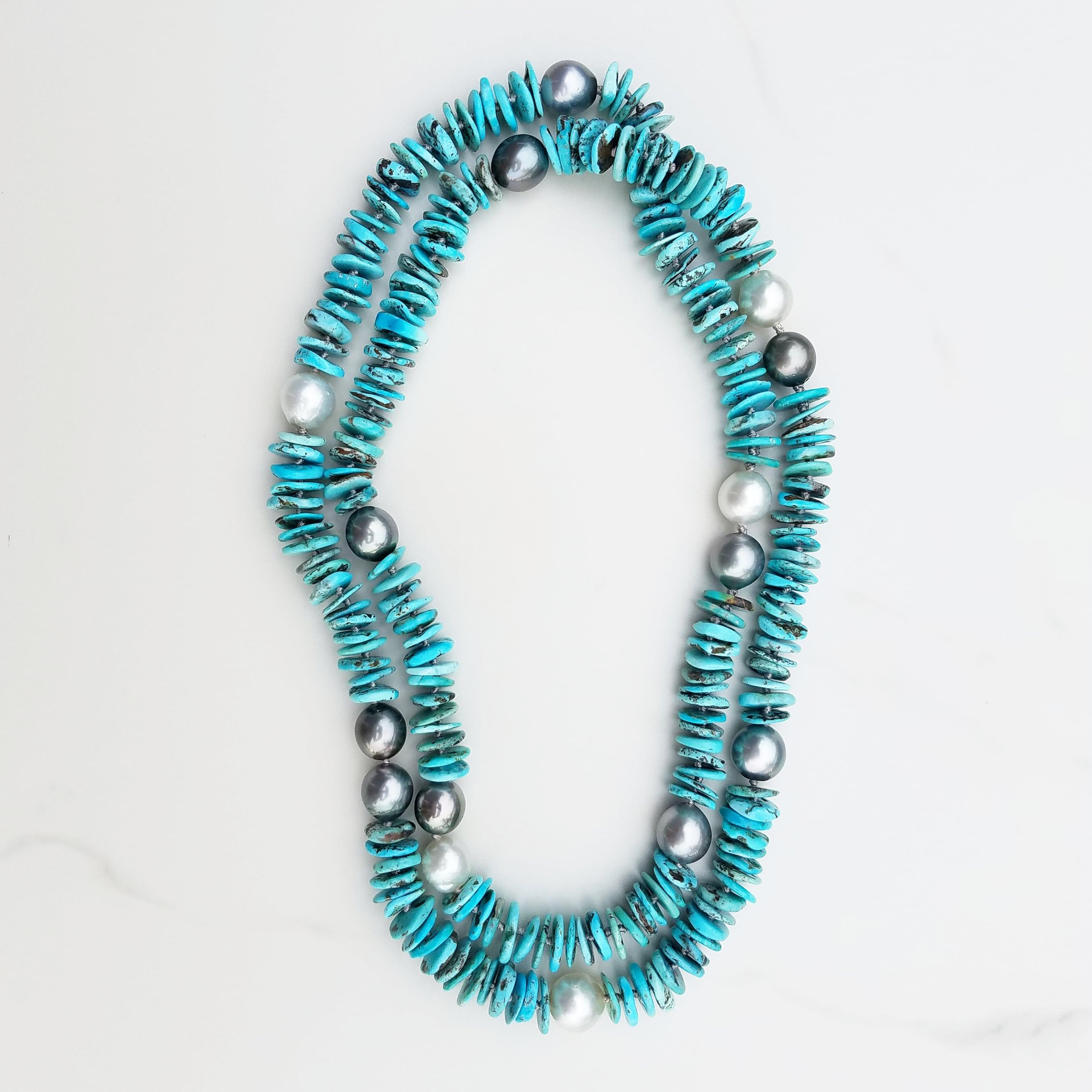 Giant Tahitian Pearls & South Sea Pearls are mixed with Natural Turquoise in this exquisite mixture of sky and sea colors. 

10 Tahitian Pearls ranging from 13.5mm to 15mm in size & 5 South Sea Australian Pearls in sizes 13mm to 14.5mm are speckled