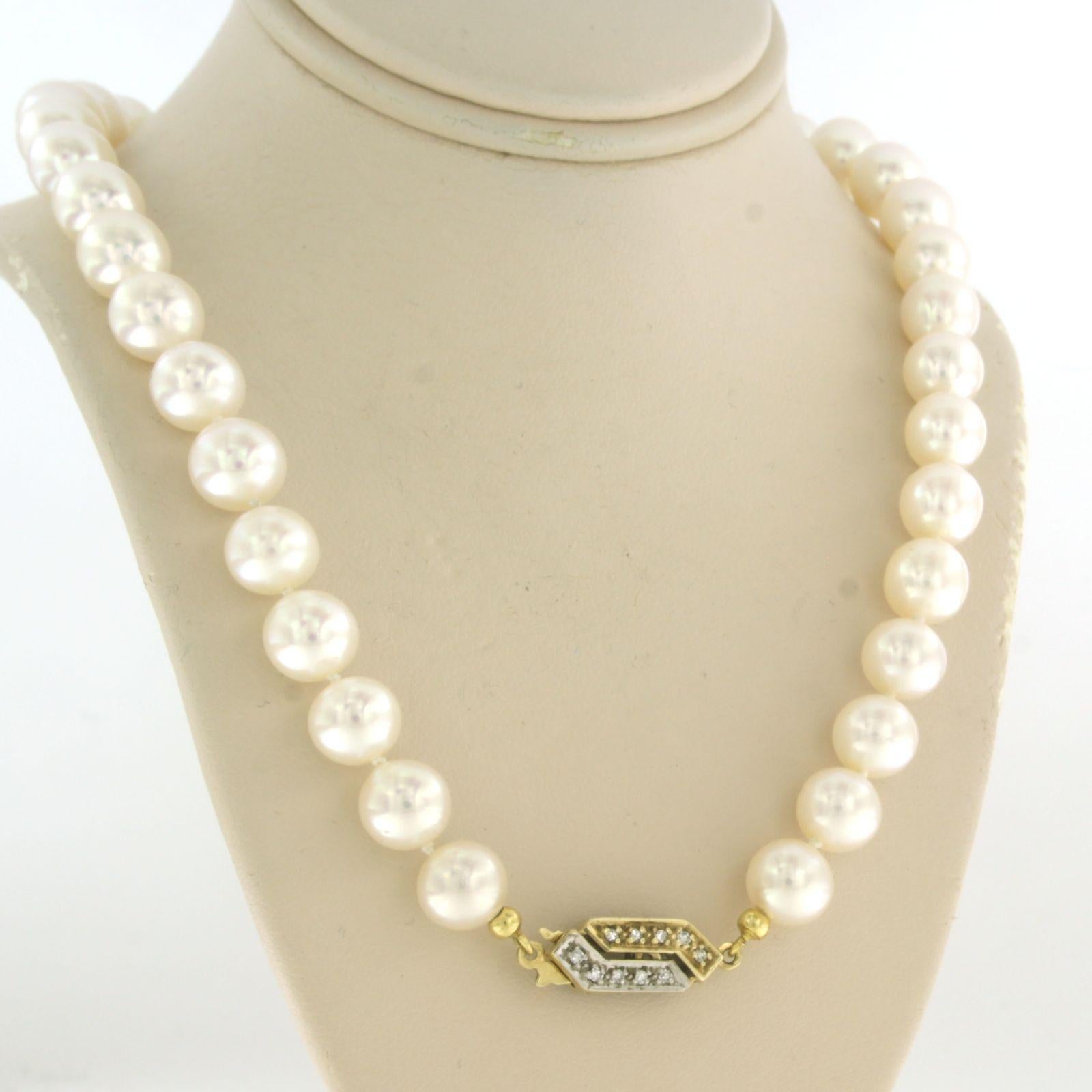 Modern Pearl bead necklace with lock set with diamonds 14k bicolour gold For Sale