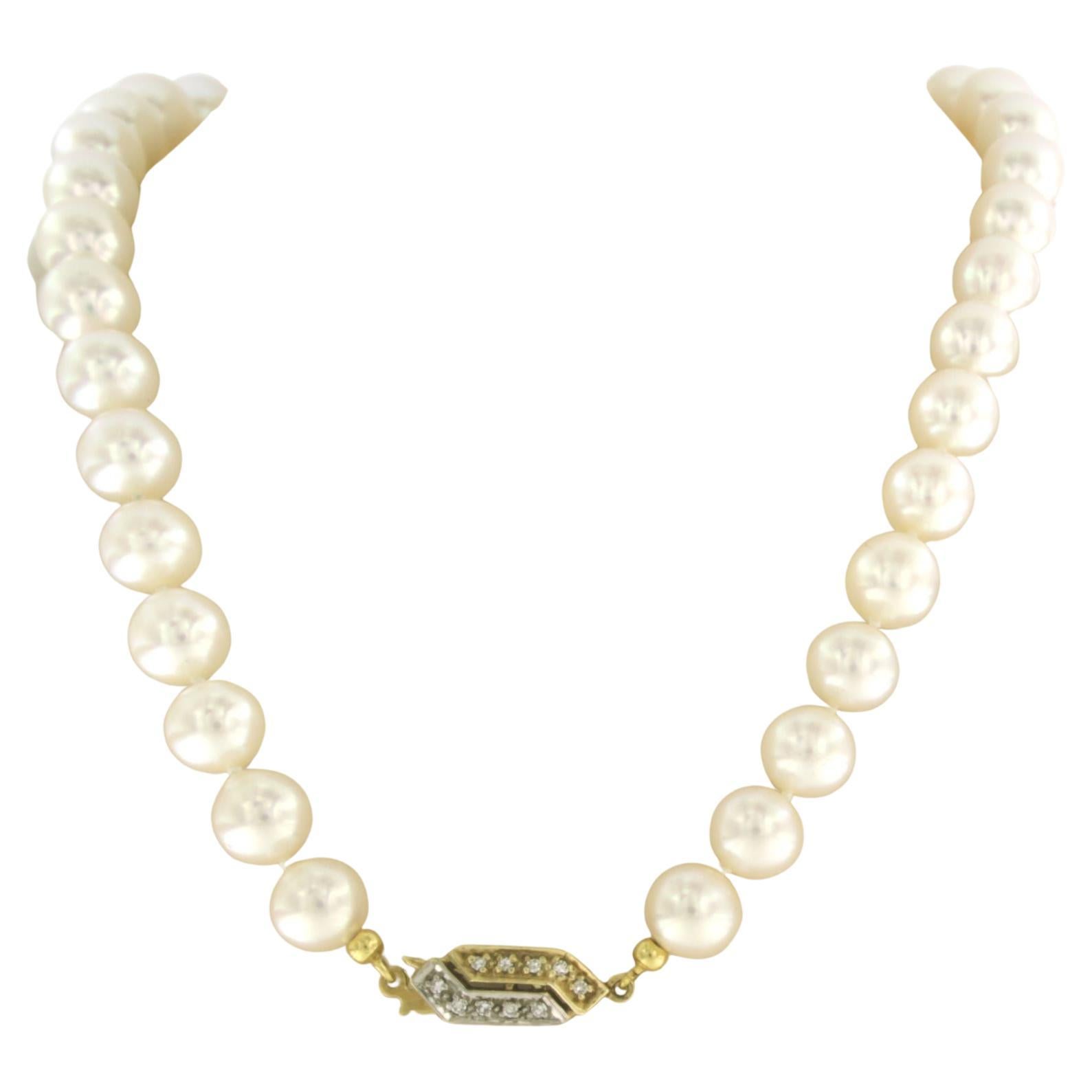 Pearl bead necklace with lock set with diamonds 14k bicolour gold For Sale