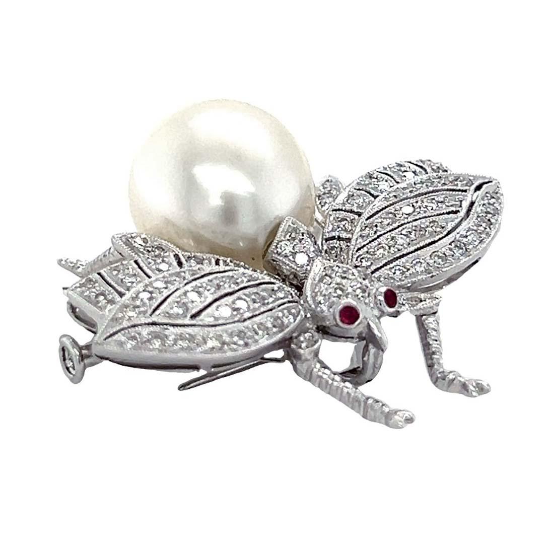 Large pearl Bee and diamond brooch in 18-karat white gold. Gracefully spread over the wings are 0.71 carats of diamonds. This timeless brooch featuring a lustrous pearl body is set in 18-karat white gold. A touch of sophistication that brings any