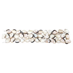 Armband aus Perlen, schwarzen Saphiren und weißen Saphiren in Silberfassung