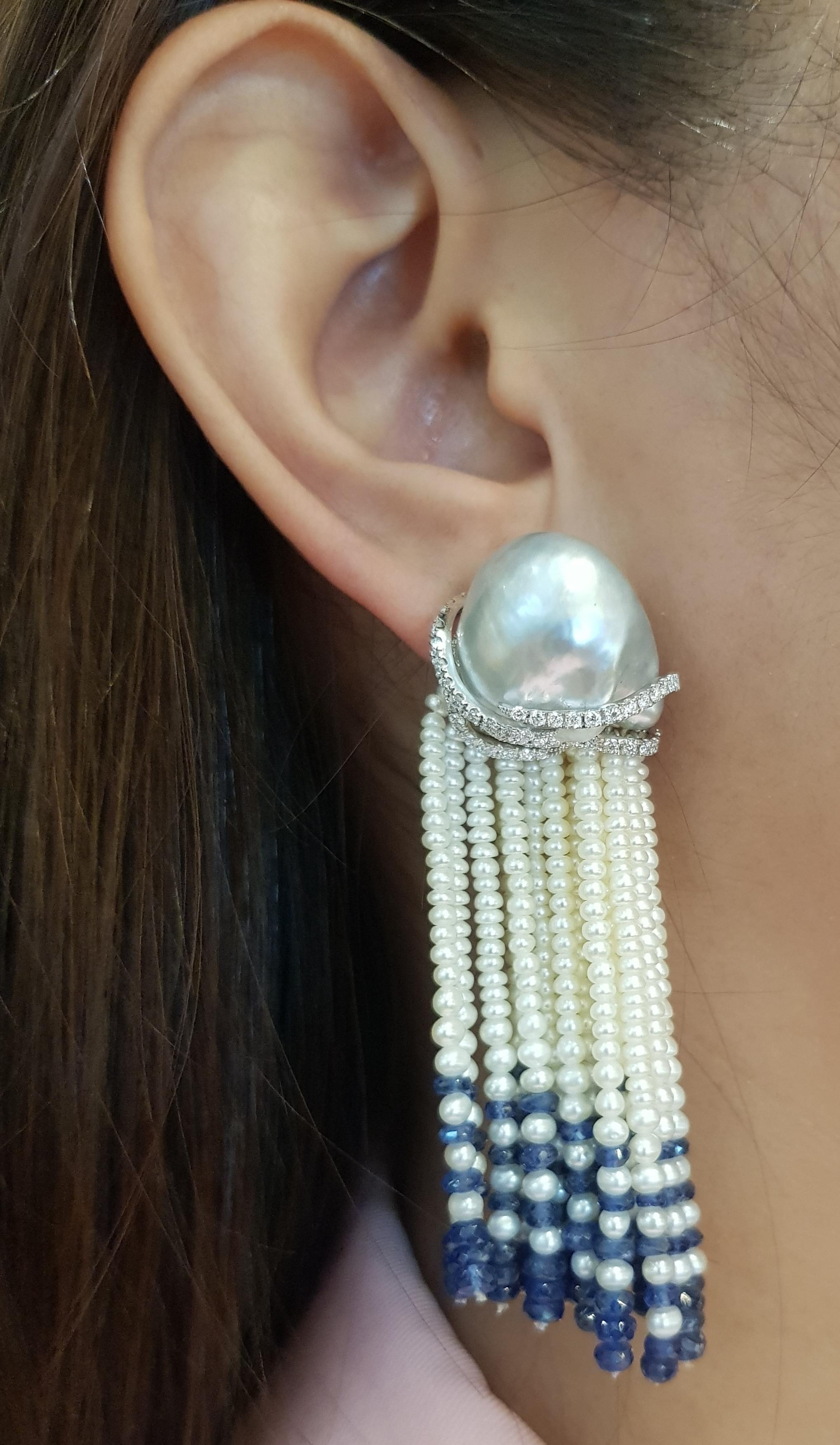South Sea Pearl, Blue Sapphire Beads 51.84 carats and Diamond 1.00 carat Earrings set in 18 Karat White Gold Settings

Width:  2.2 cm 
Length:  7.0 cm
Total Weight: 44.23 grams

