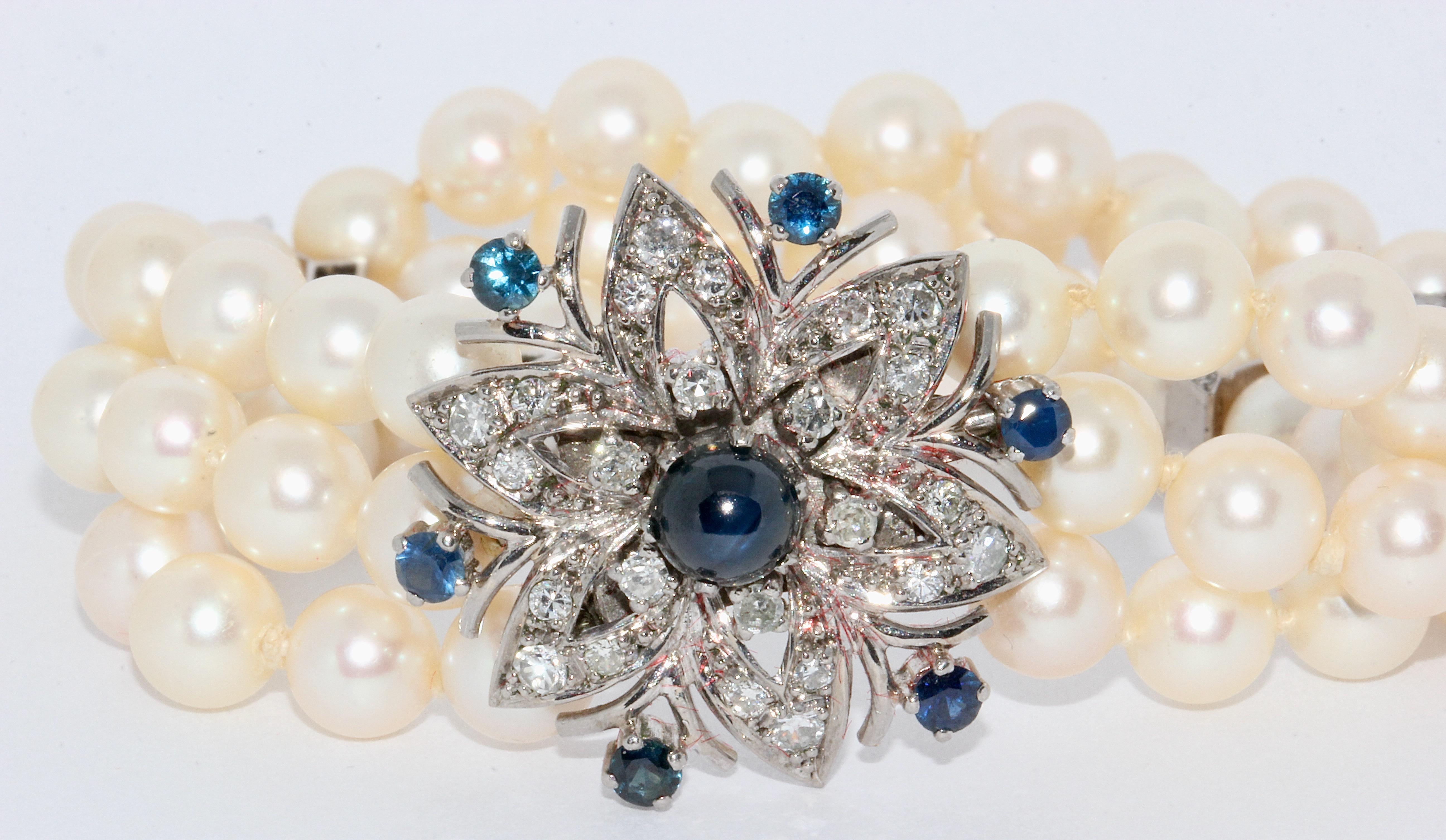 Round Cut Pearl Bracelet with Large White Gold Clasp, Set with Sapphires and Diamonds For Sale