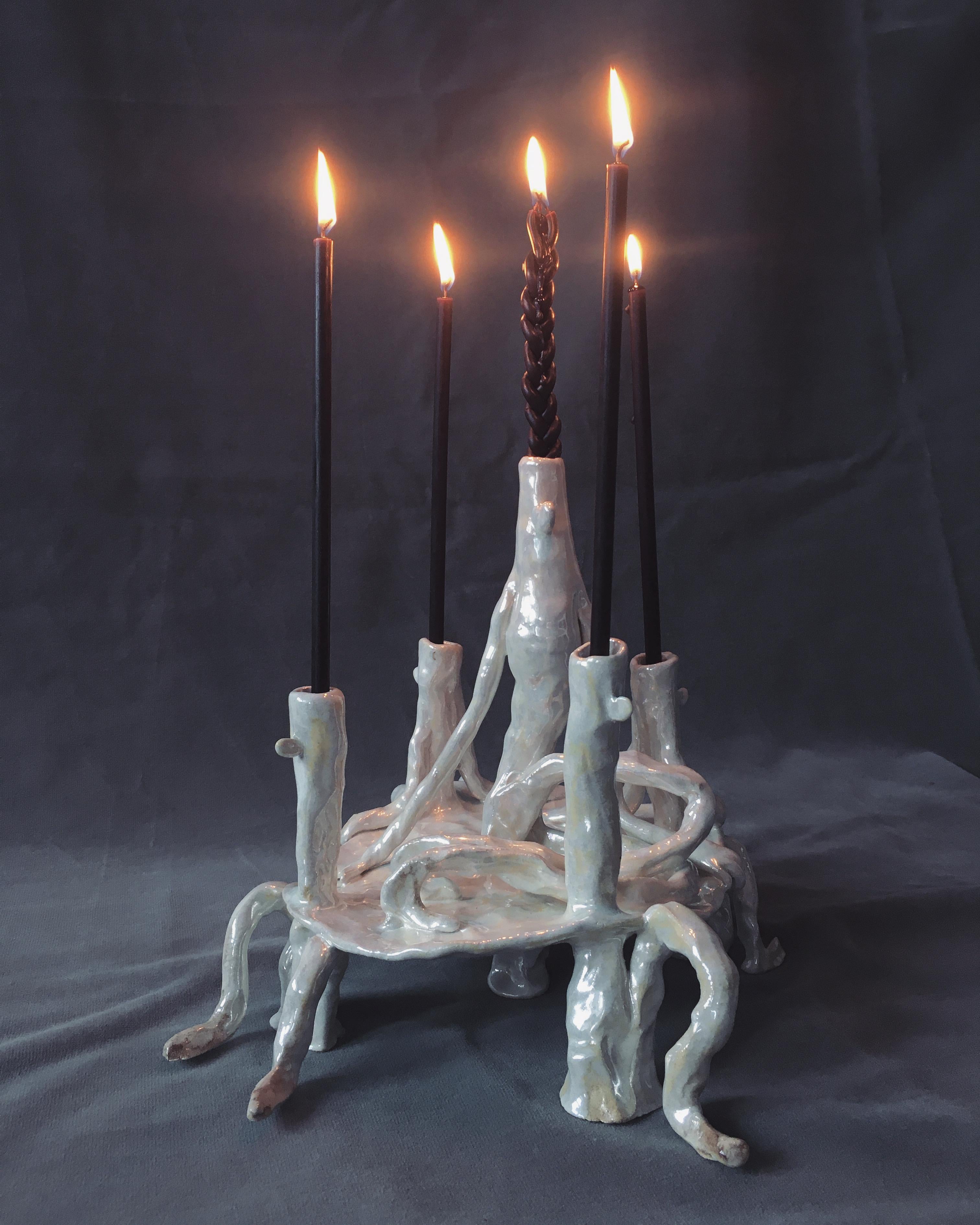 Pearl candle holder by Ana Botezatu.
Dimensions: D 26.5 x W 21 x H 22 cm.
Materials: glazed earthenware.

Ana Botezatu (b. 1982, Bra?ov (former Kronstadt), Romania) lives and works in Berlin. She works with ceramics, drawing, book illustration,