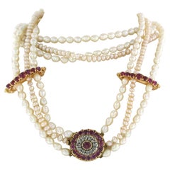 Pearl chain with lock set with ruby and diamonds 18k yellow gold and silver
