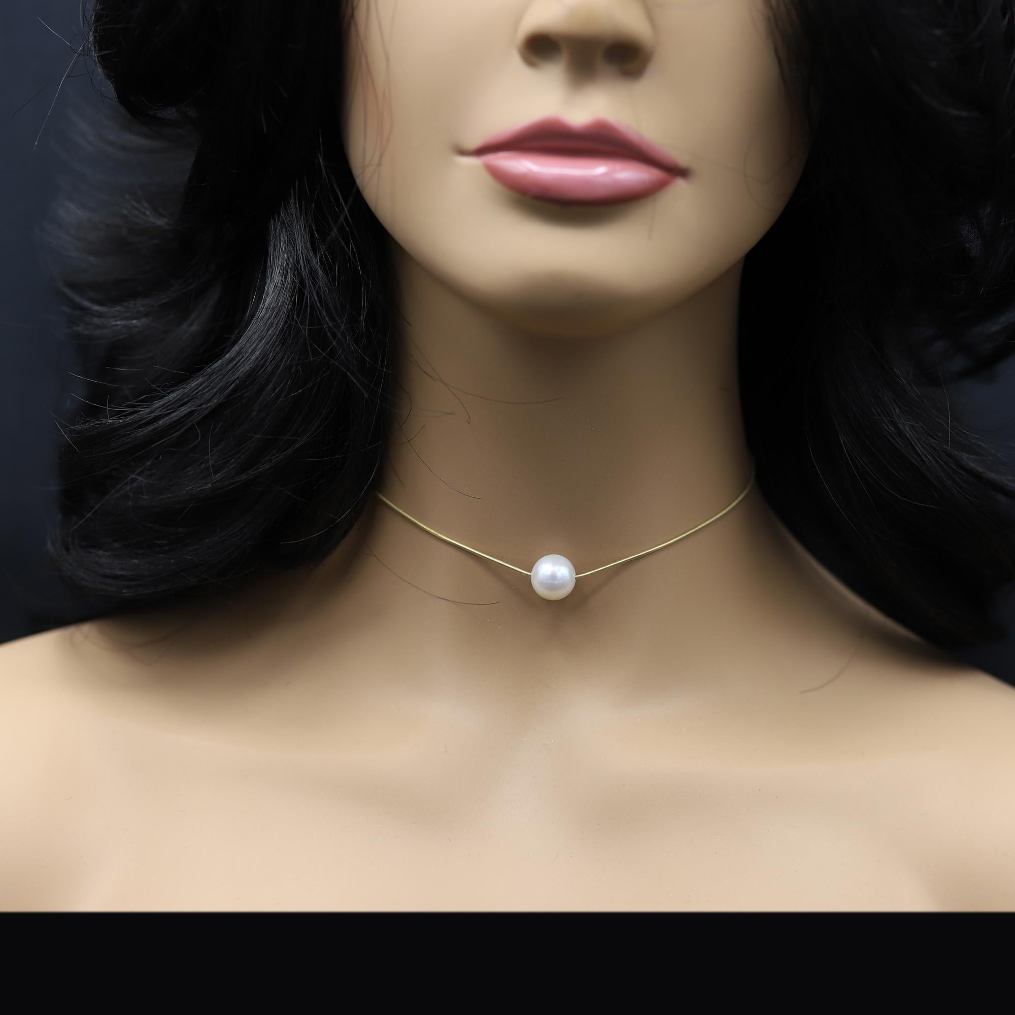 Trendy Choker - Very Elegant & Fashionable.
18k Yellow Gold snake chain - thin and elegant, Total weight 6.0 grams
Pearl size is 11 mm,  Good Luster fresh- water pearl
Adjustable extension 12.5' - 15.25'  Inch - great for choker sizes
Chain type -