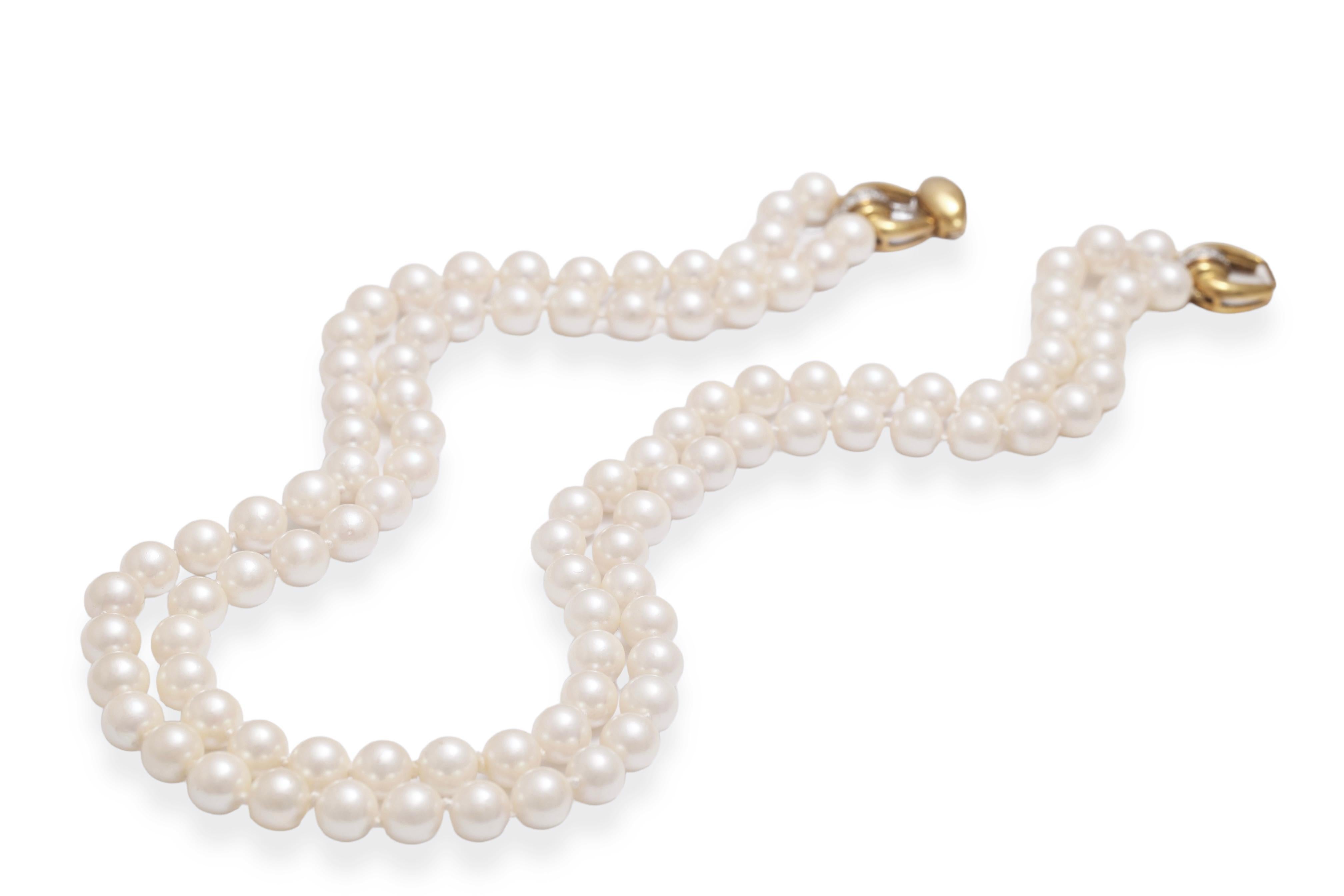 Collana a girocollo di perle con 18 kt. Serratura a forma di fiocco in oro con diamanti in vendita 7