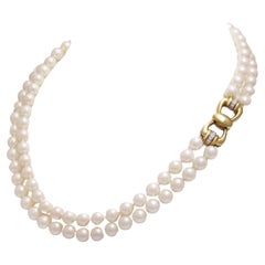 Pearl Choker Necklace With 18 kt. Gold Bow Shape Lock With Diamonds