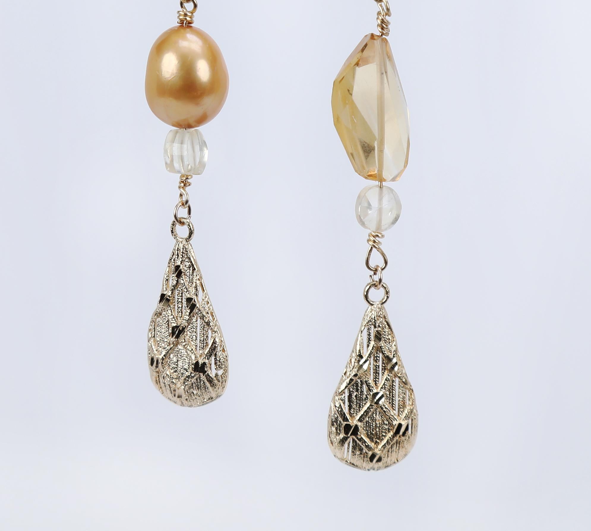 Pearl, citrine, and gold earrings beckon all romantics and romantics who love to give.  
