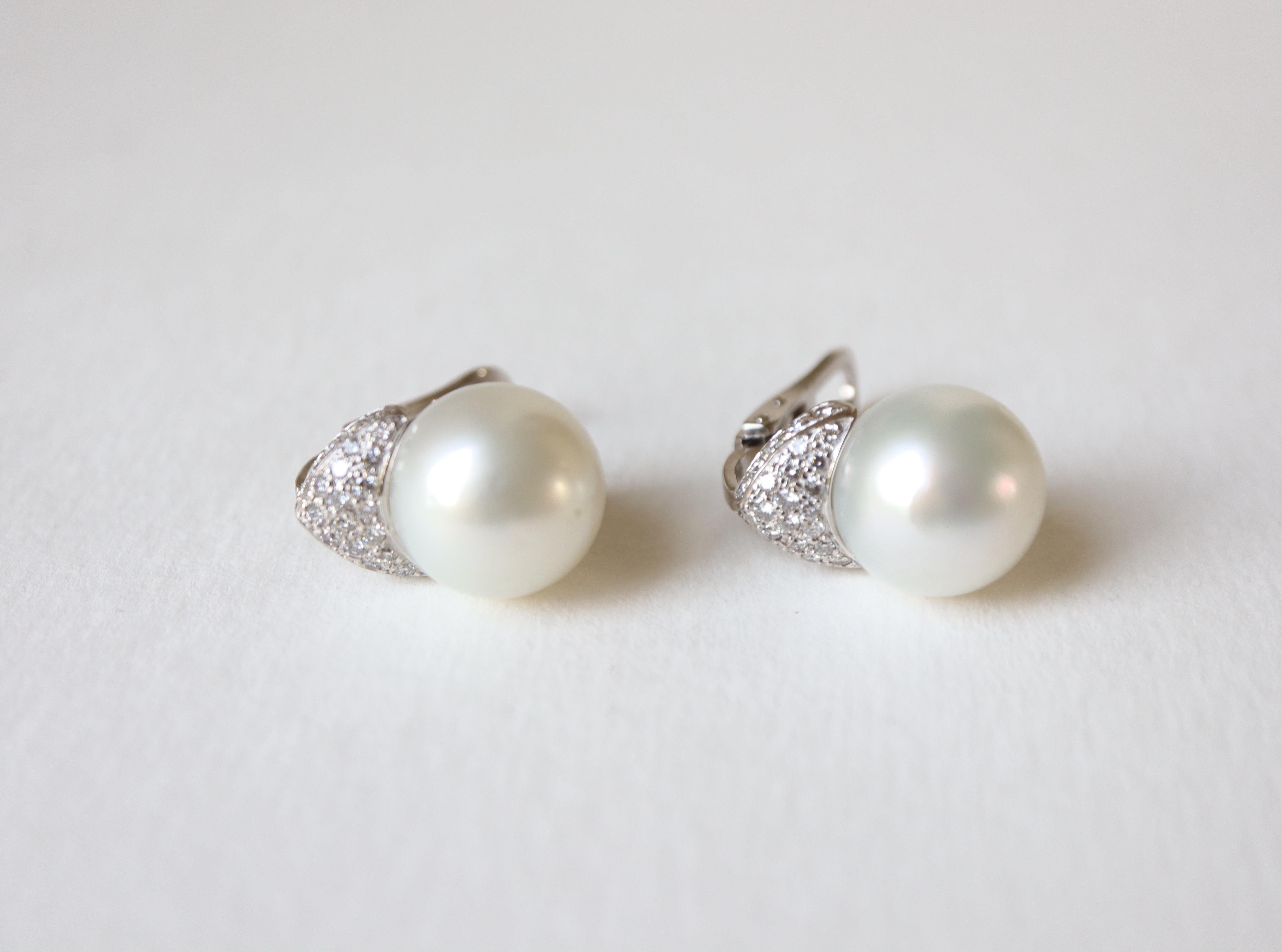 Brilliant Cut Pearl Clip Earrings 18 Carat White Gold Set with 0.7 Carat of Diamonds For Sale