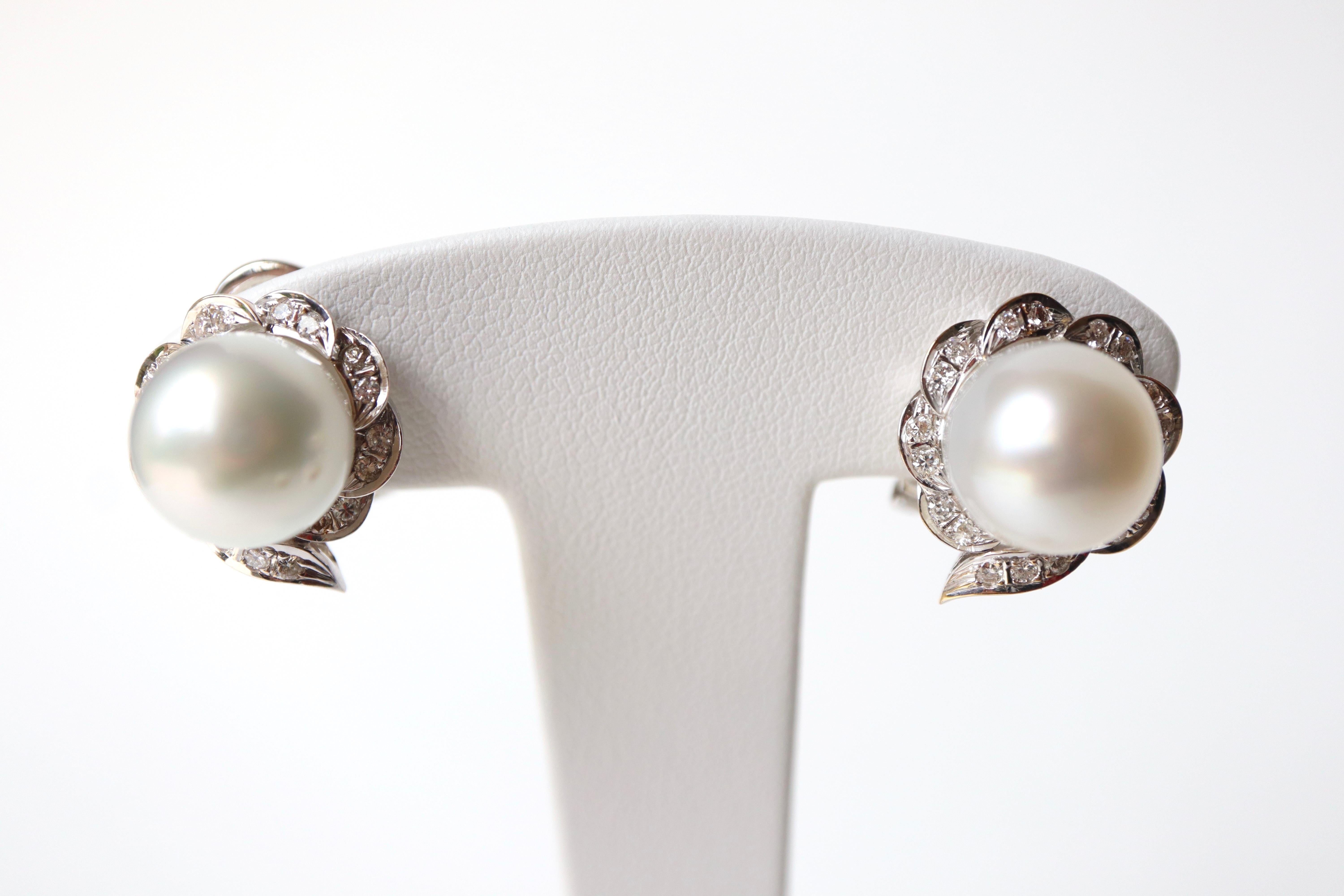 Romantic Pearl Clip Earrings 18 Carat White Gold Set with Diamonds circa 1960 For Sale
