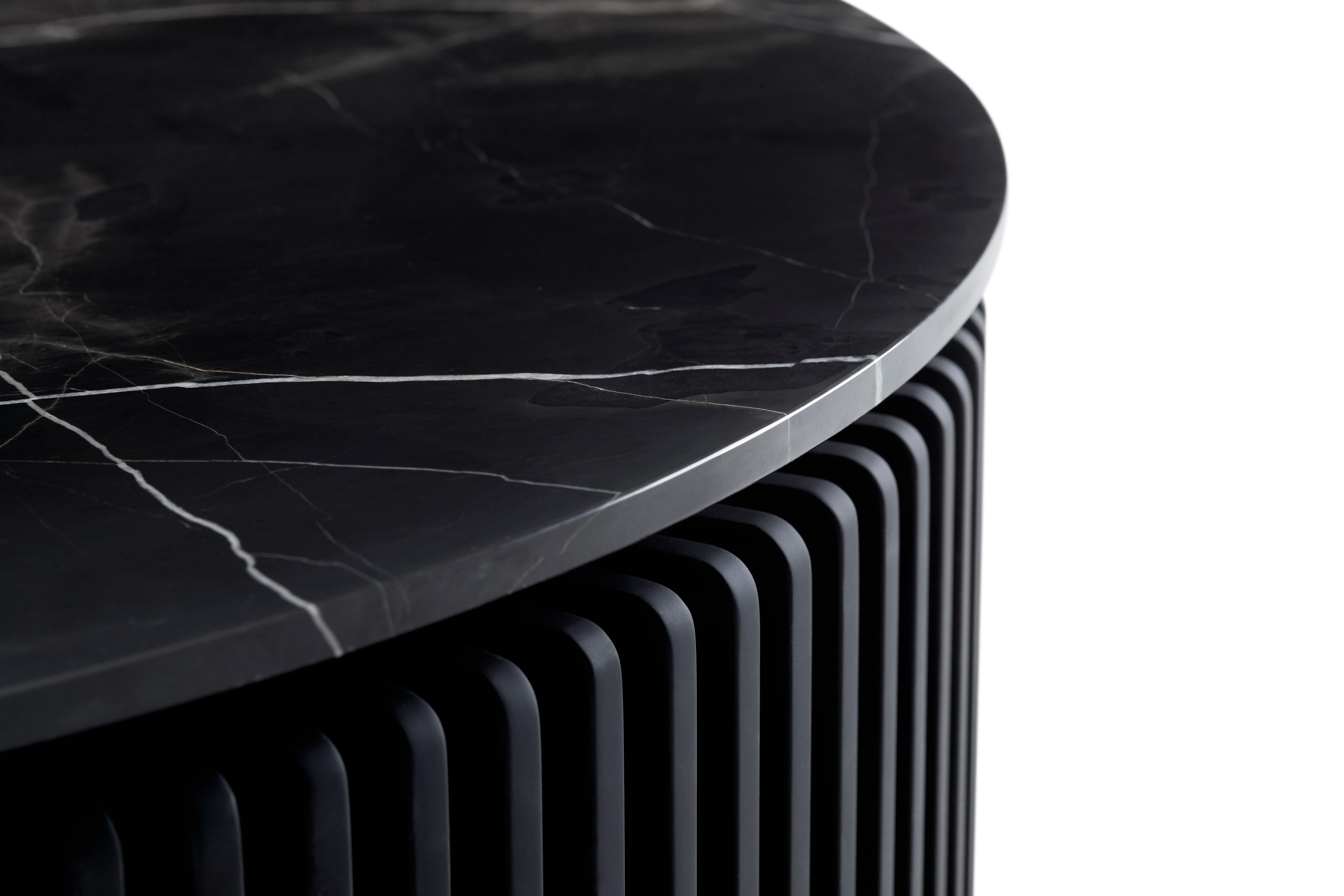 Pearl: This unique artisan made table the wooden slats are produced one by one and painted in softtouch black color before fitting. The tabletop is made of Italian moonflower marble. This new product is produced by craftsmen who are leading experts