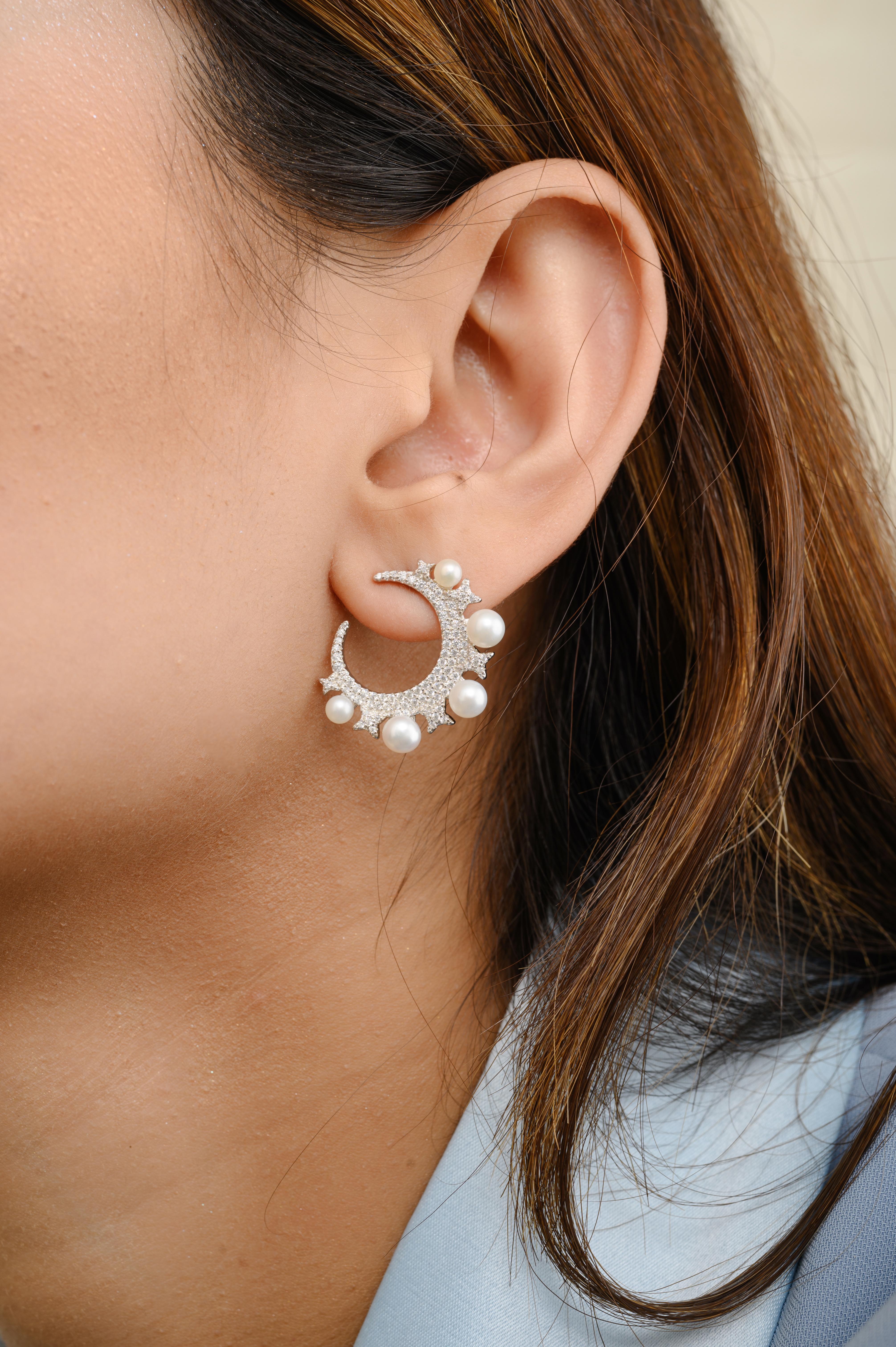 Pearl Cubic Zirconia Big Half Moon Pushback Earrings in sterling silver. You shall need these statement earrings to make a statement with your look. Each piece features dazzling cubic zirconia stones, renowned for their brilliance and clarity, set