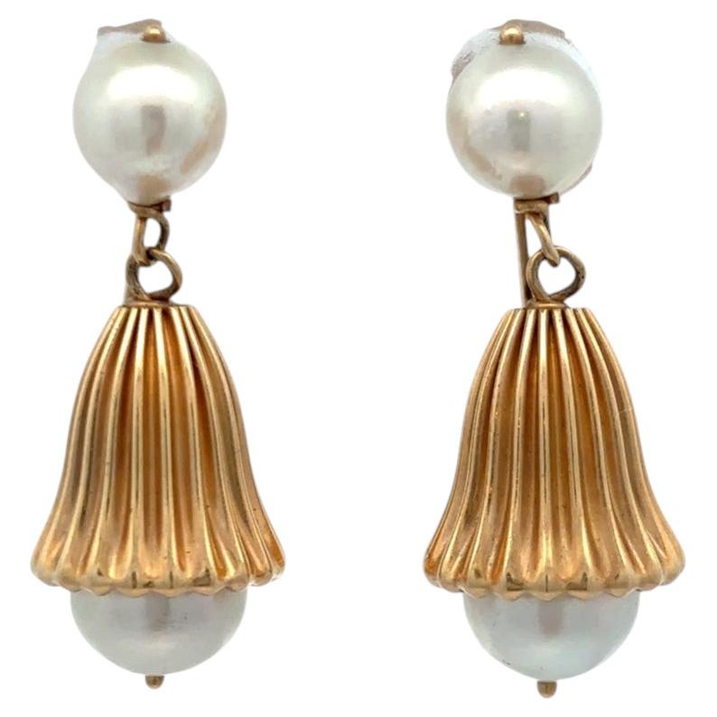 Orecchini con perle in vendita