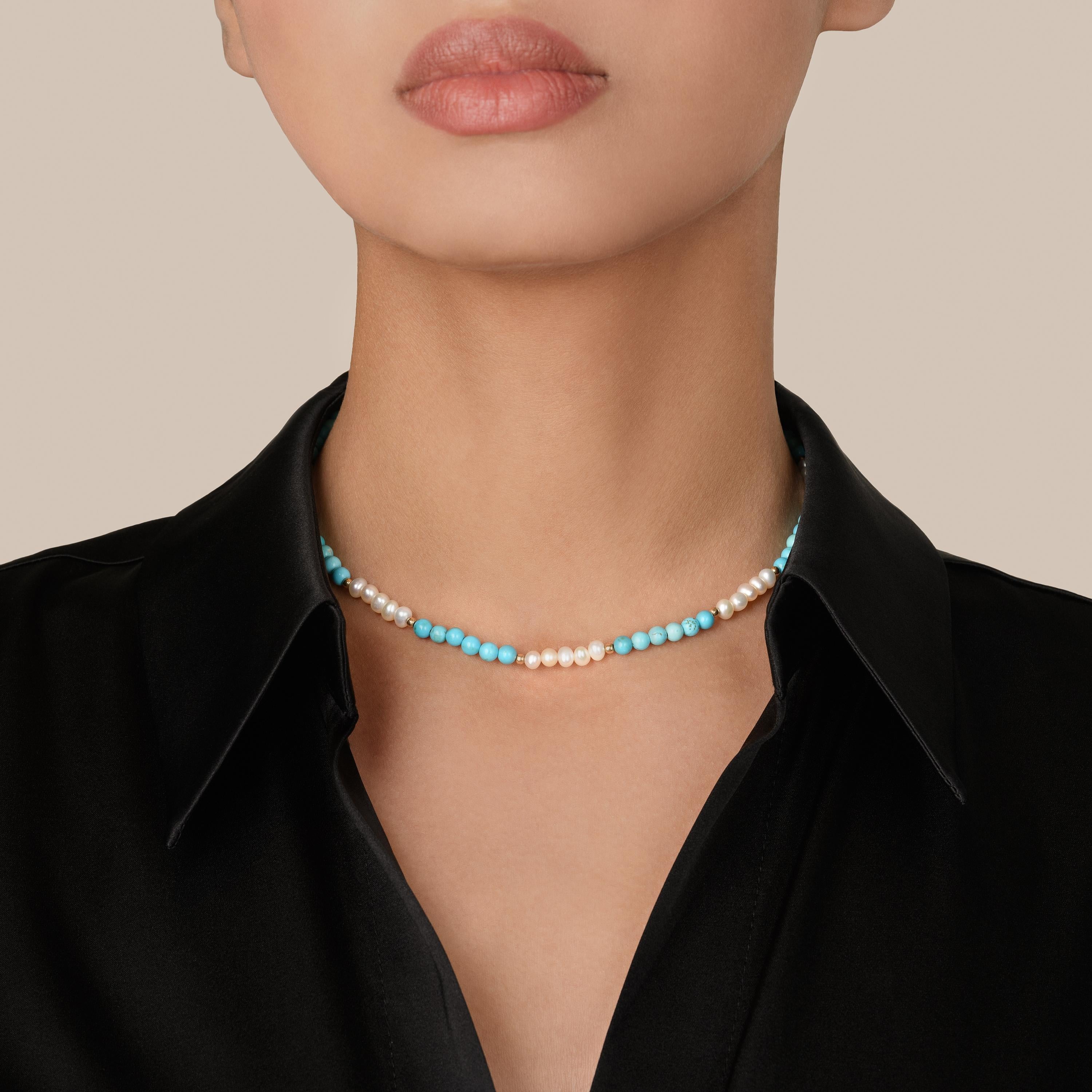 Introducing our exquisite Pearl and Turquoise Necklace, a captivating blend of elegance and modern allure. This enchanting piece features luminous pearls, complemented by vibrant turquoise accents. It is a celebration of timeless beauty with a