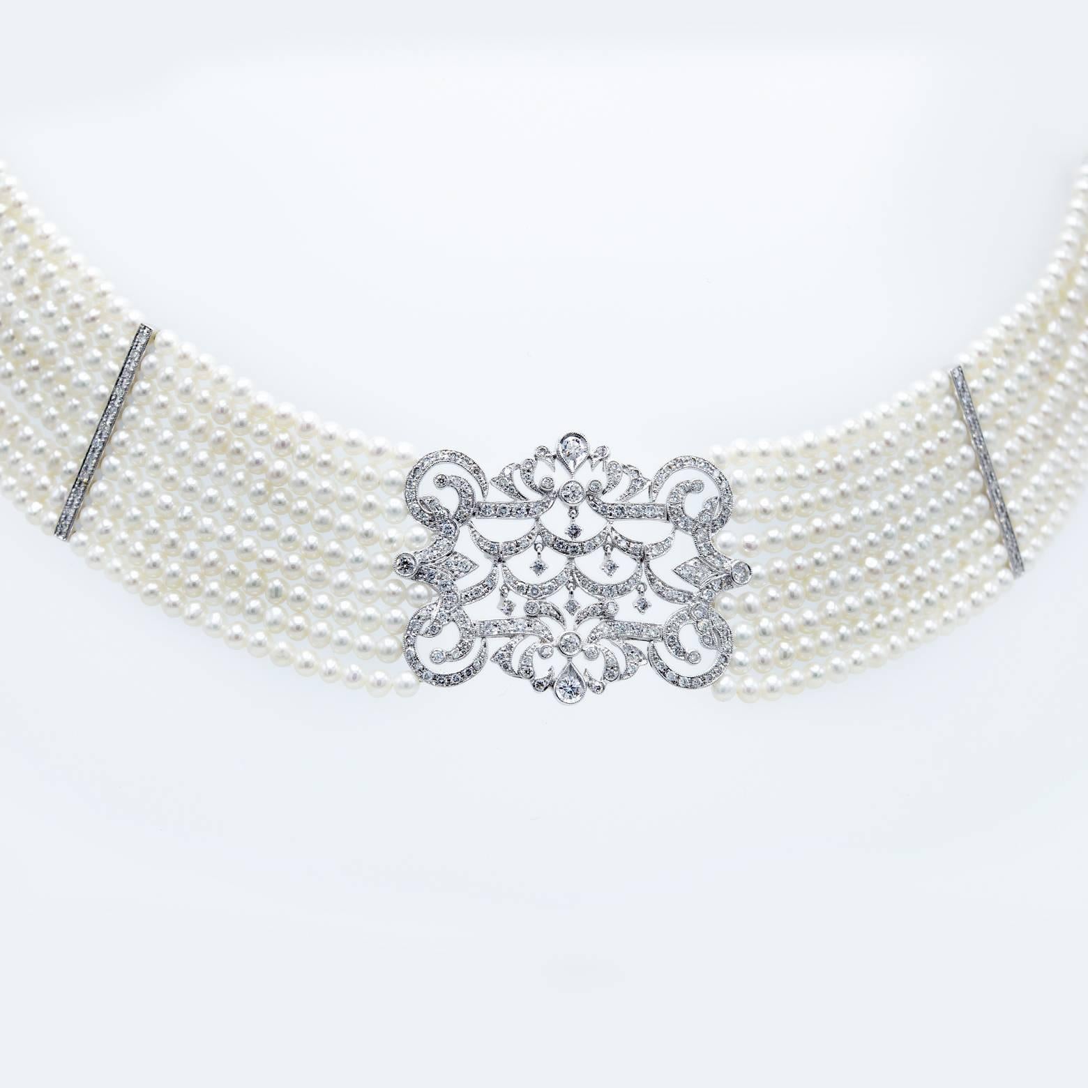 Absolutely Stunning! Diamonds and Pearls, extravagant, multi-layered, and gorgeous! The pearls are delicate and in the bountiful while the diamond center piece sparkles from across the room! I don't know if there is a piece more fair! This season of