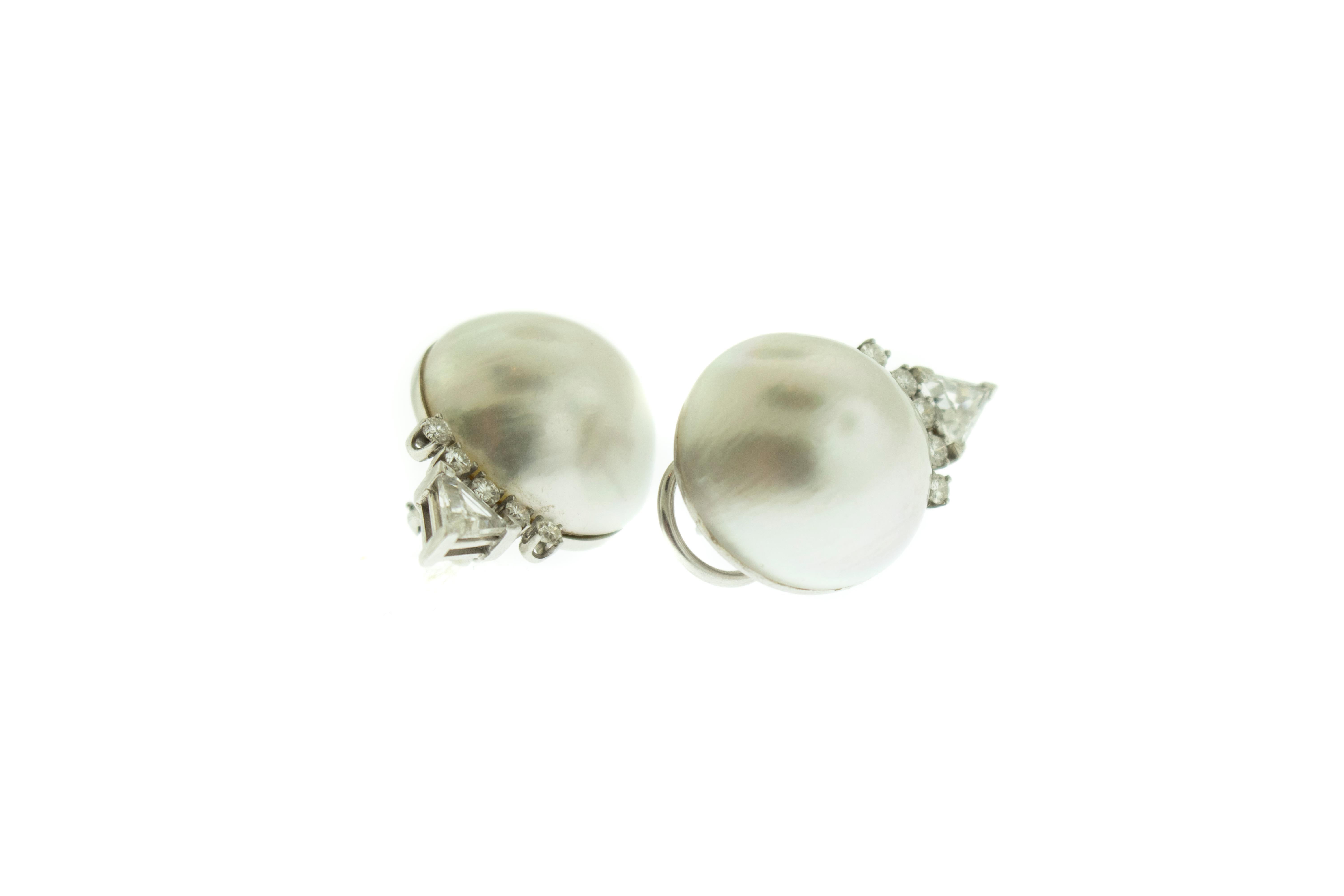 Pearl Diamond 14k White Gold Earrings. Half Pearls are decorated with five round diamonds and one larger triangle diamond on top. Earrings have spring back cover for safety while wearing. Total weight 14.76 grams