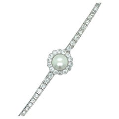 Bracelet de perles et diamants