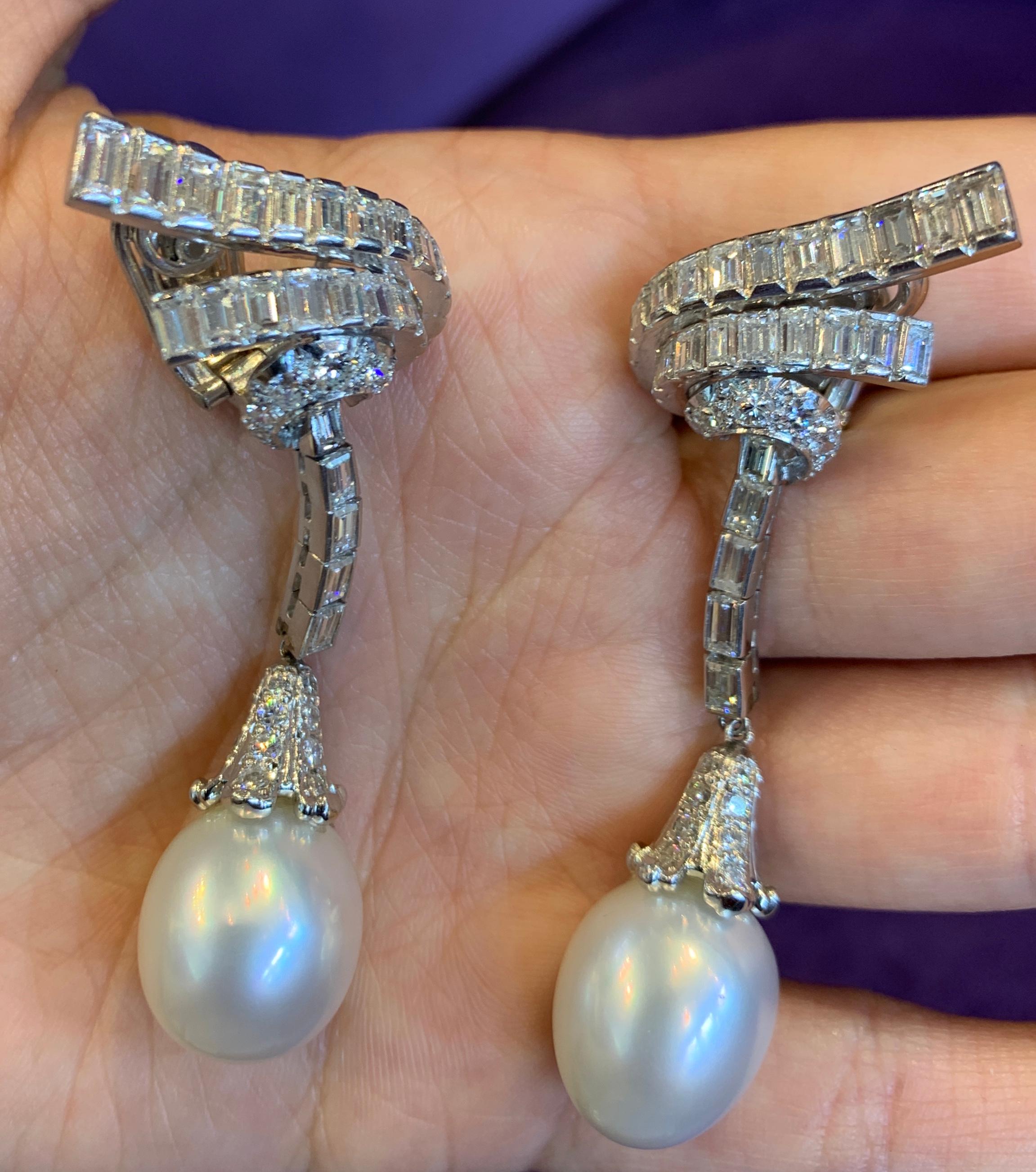 Pearl & Diamond Drop Earrings 
Circa 1940
Back Type: Clip On 
52 Baguette cut diamonds (both earrings)
60 Round cut diamonds (both earrings)
Length: 2.5 inches