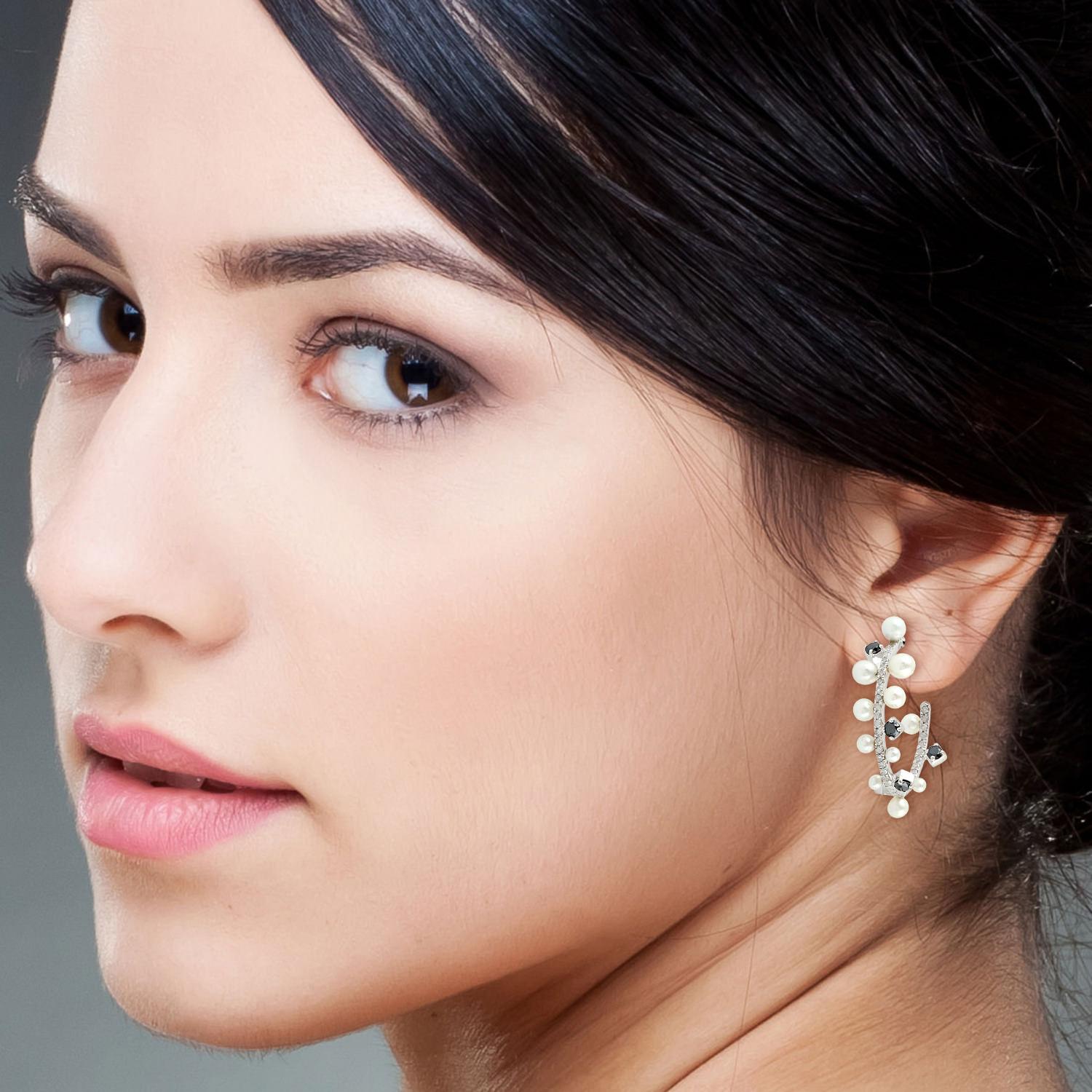 Handcrafted from sterling silver, these beautiful hoop earrings are set with 5.52 carats pearl and 1.54 carats diamonds.

FOLLOW  MEGHNA JEWELS storefront to view the latest collection & exclusive pieces.  Meghna Jewels is proudly rated as a Top