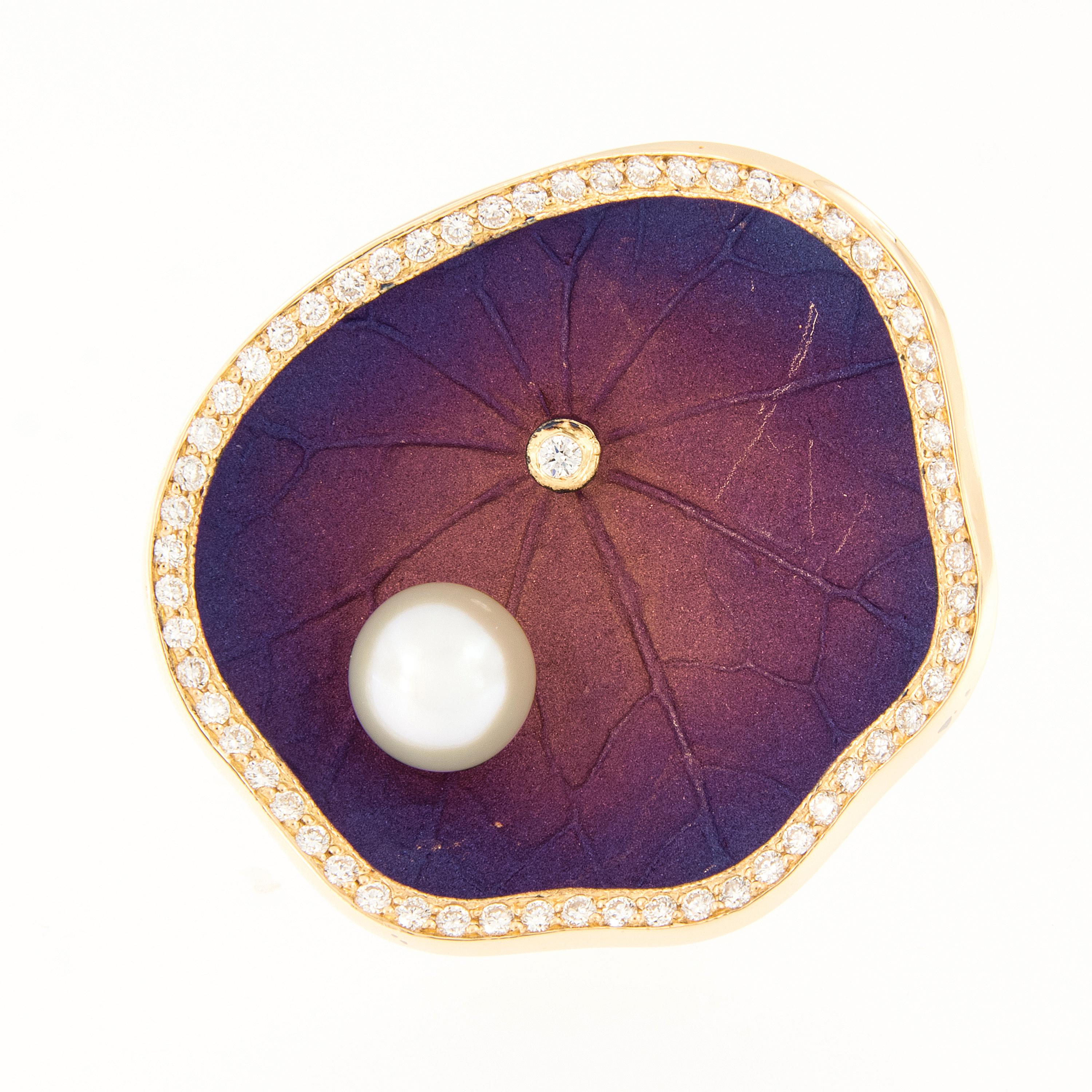 Unique statement ring crafted in 18k yellow gold featuring a stylized lily pad with an anodized purple finish, framed in diamonds, accented with a cultured pearl and a bezel set diamond. Ring size 6. Weighs 13.3 grams.

Diamonds 0.42 cttw
Pearl 6.5