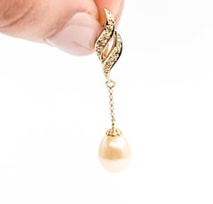 Pendentif perle et diamant en or jaune 18k