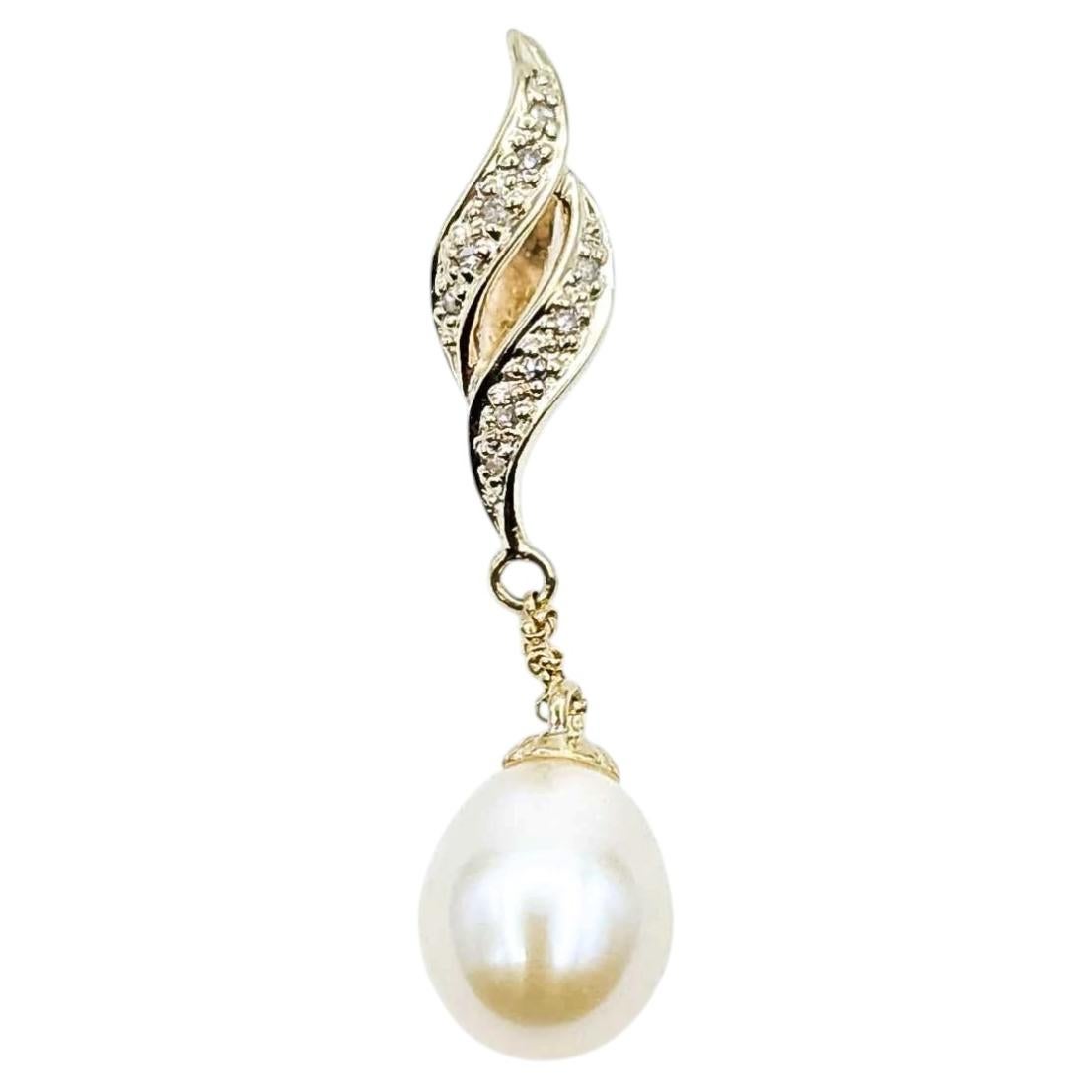 Ciondolo con perle e diamanti in oro giallo 18k