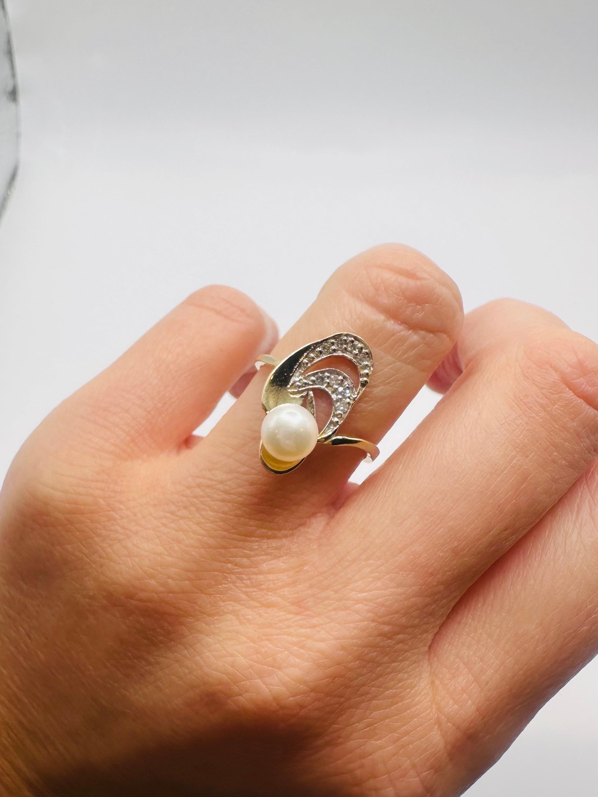 Inspired by Japan, this design is made with natural white fresh water pearl and diamonds in white and yellow gold, ring is size 8 and can be re-sized. The ring is very artistic and one of a kind work. 
**All items leave our premises with a