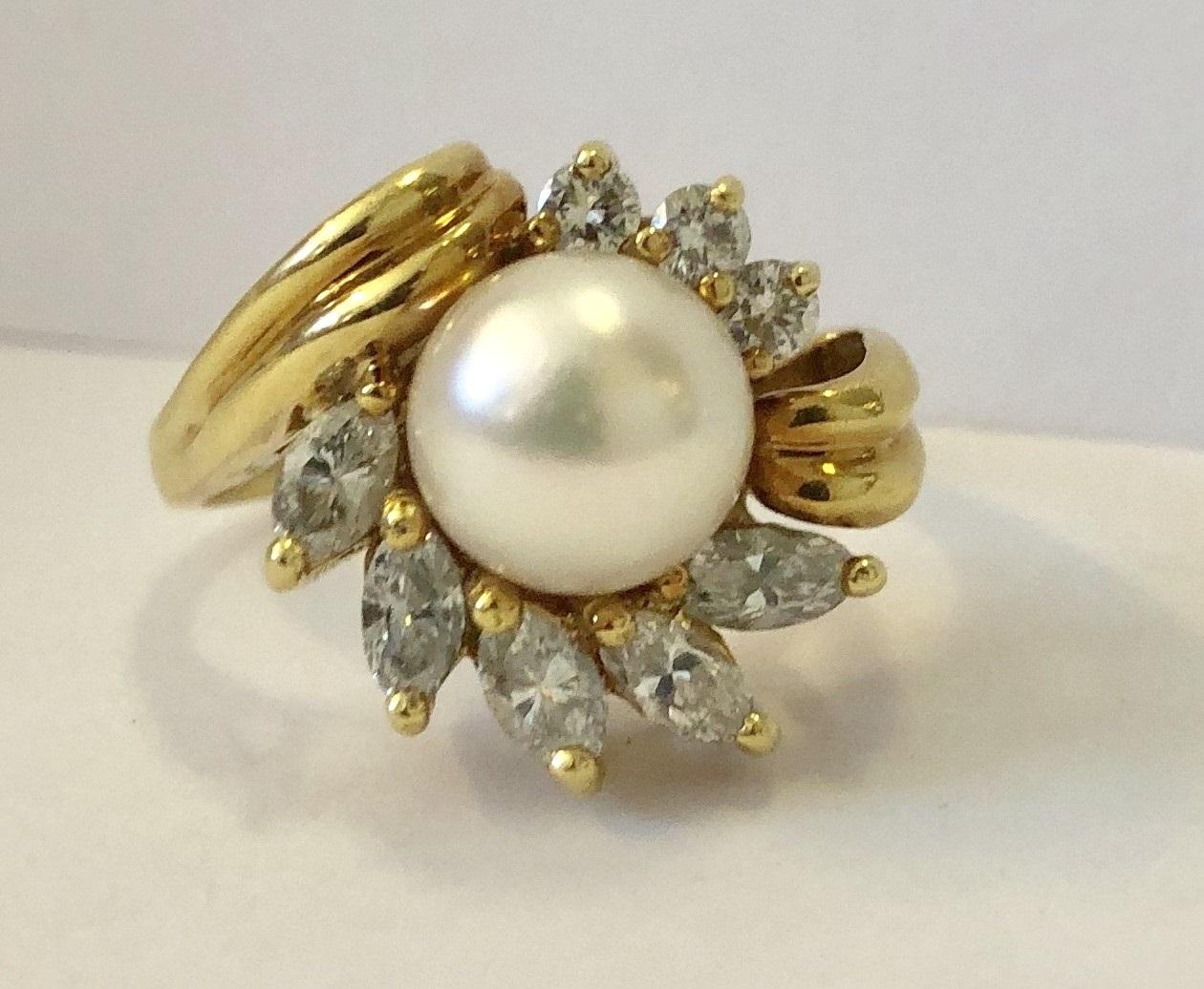 Pearl & Diamond Ring, Black, Starr & Frost
Centered by a cultured pearl measuring 8.14 mm, enhanced by marquise and full-cut diamonds, 
weighing a total of approximately 0.50 carat 
mounted in 18k gold, marked BS&F.
7.50 grams, size 5 3/4