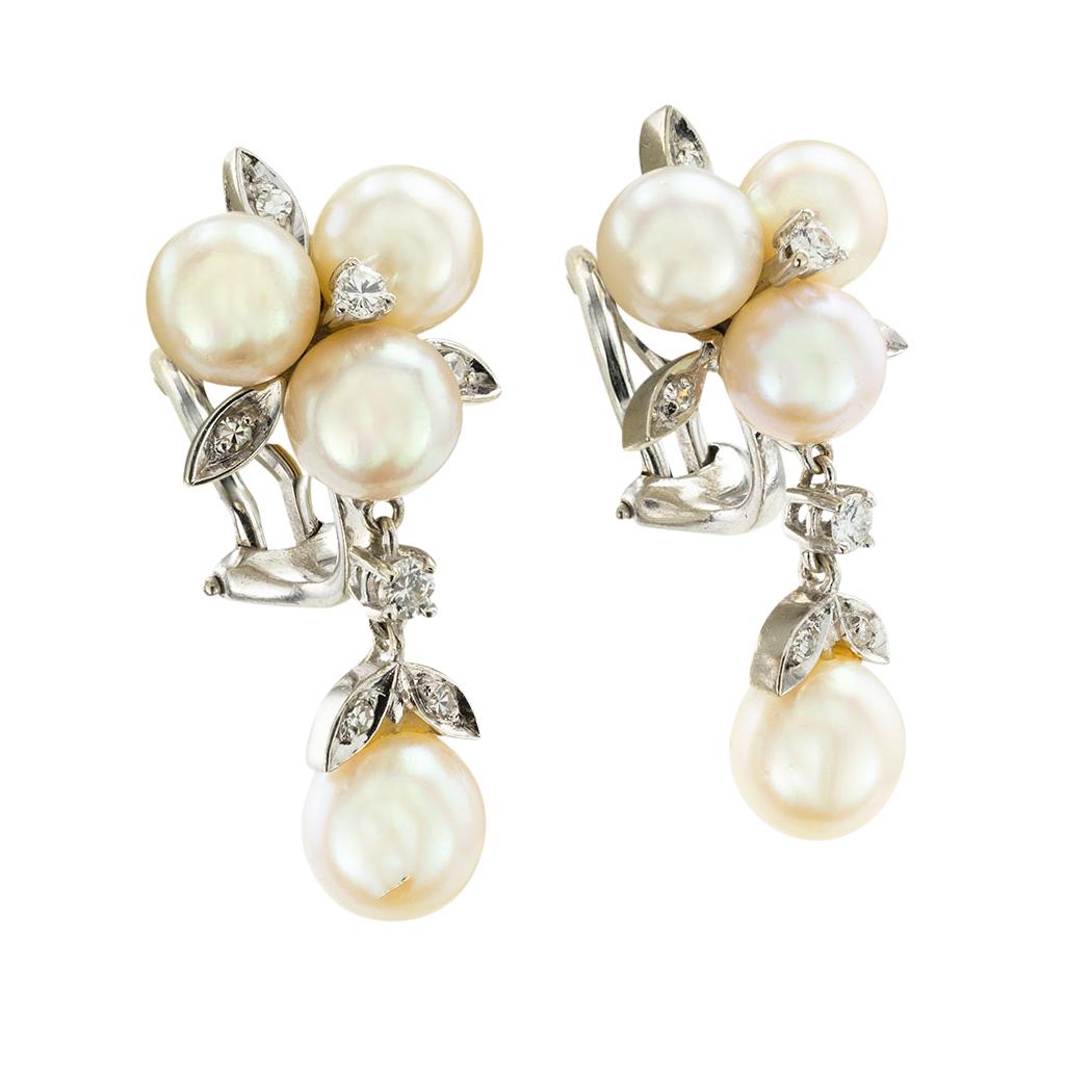 Akoya cultured pearls diamonds and white gold clip-on earrings circa 1950. *

ABOUT THIS ITEM:  Elegant and timeless, these Akoya cultured pearl earrings speak to you about the kind of elegance women were fond of during the time when they were made.