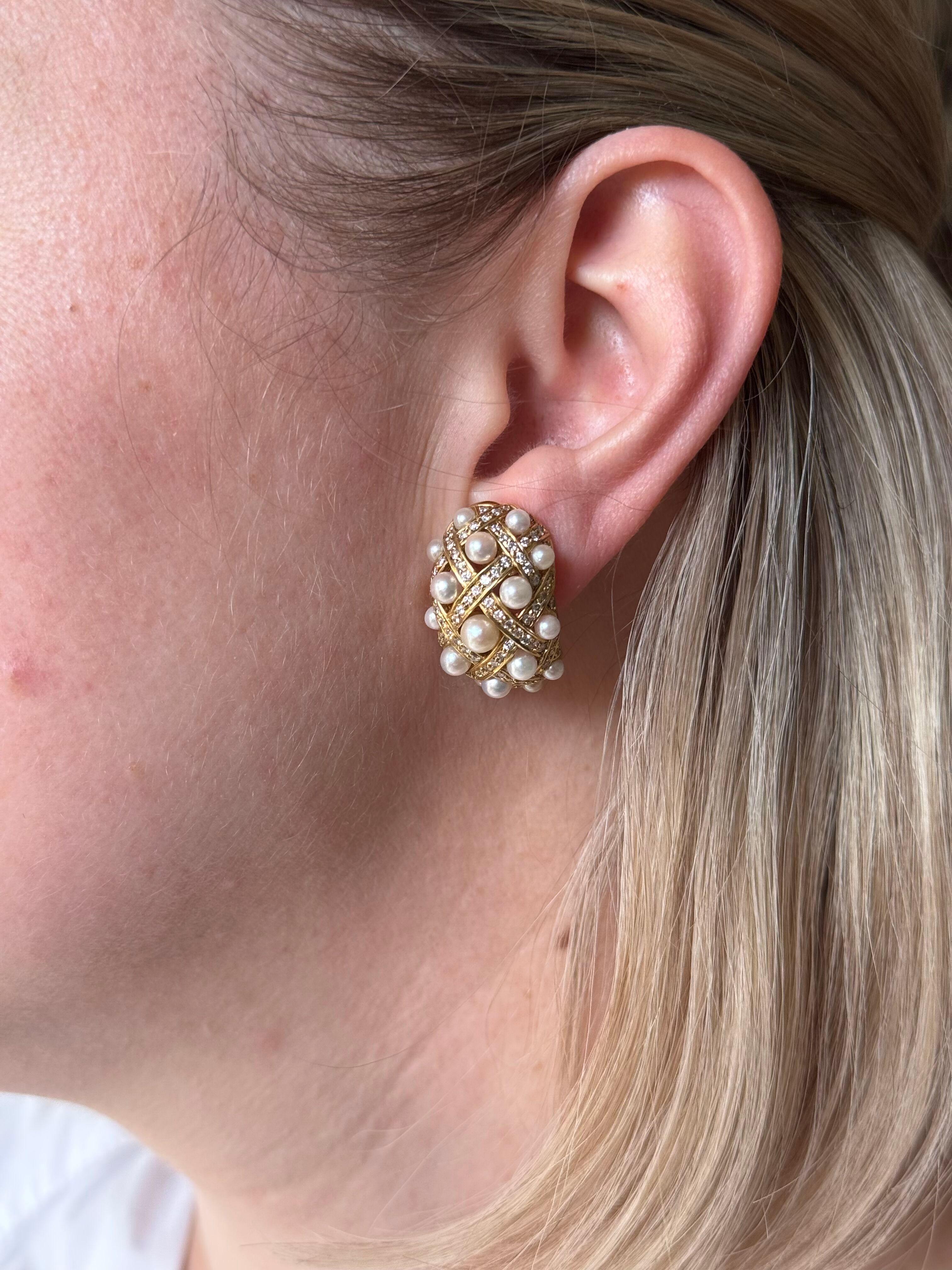 Pair of 18k yellow gold domed shaped earrings, with 3mm to 5mm pearls and total of approx. 0.80ctw H/Si1 diamonds. Earrings measure 26mm x 19mm. Marked 18k and 750 on the back. No posts - for non pierced ears, posts can be easily added. Weight -
