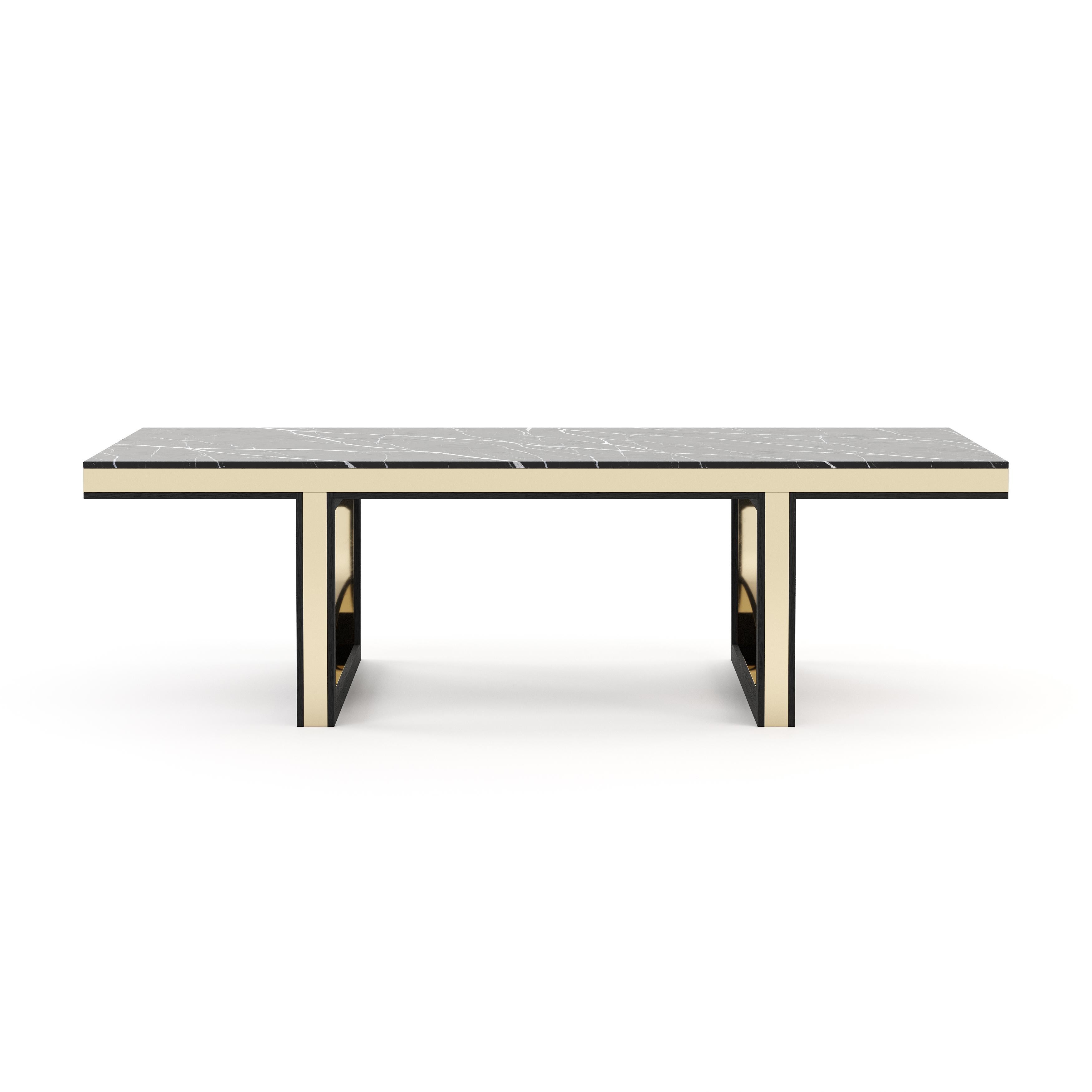 Pearl dining table features an intricate marble top and a sculptural base for adding glamour to any home design. Hand-sculpted from robust marble and wood, this is an impressive table with stainless steel details. A noble addition for majestic